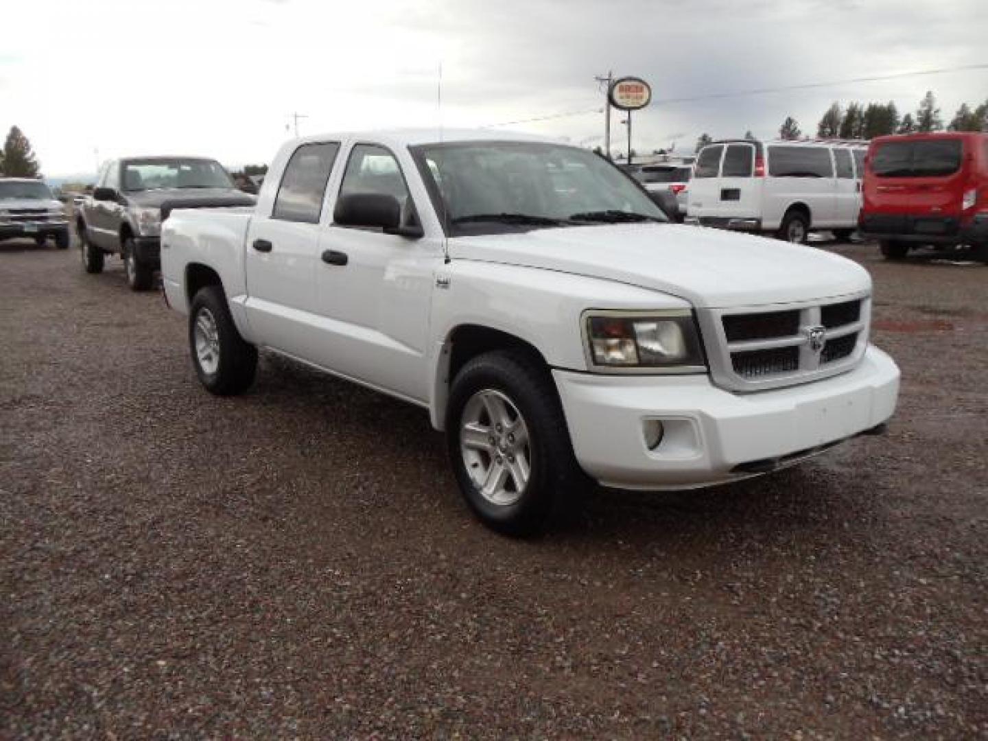 2010 White /Grey Dodge Dakota Bighorn (1D7RW3GP2AS) with an 4.7L V8 SOHC 16V FFV engine, 5-Speed Automatic transmission, located at 5465 Highway 2 W., Columbia Falls, MT, 59912, (406) 892-4407, 48.352188, -114.240929 - 4.7L V8 Cruise AC CD Tilt wheel Towing Power windows door locks and mirrors Brand new tires. - Photo#0