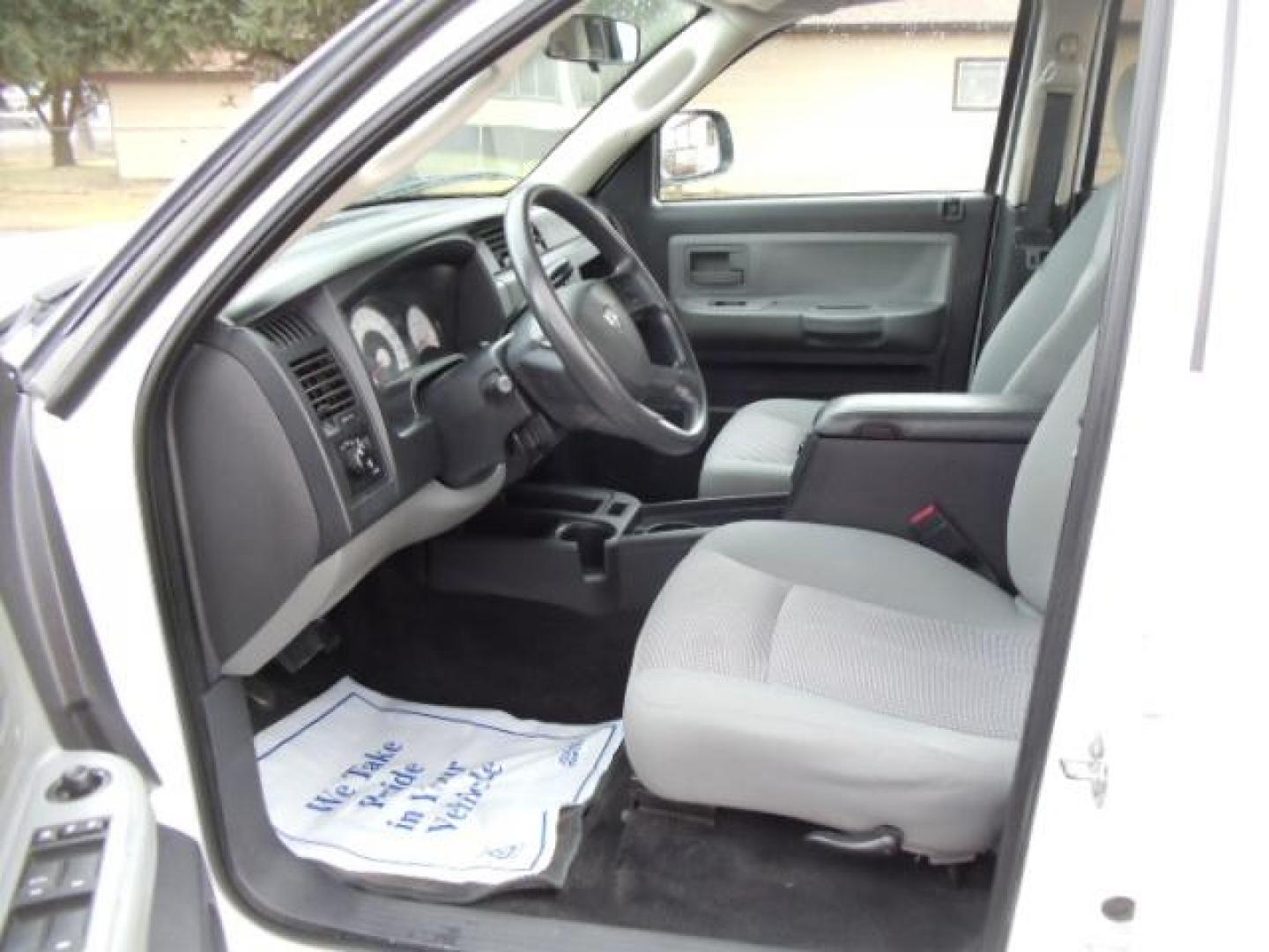 2010 White /Grey Dodge Dakota Bighorn (1D7RW3GP2AS) with an 4.7L V8 SOHC 16V FFV engine, 5-Speed Automatic transmission, located at 5465 Highway 2 W., Columbia Falls, MT, 59912, (406) 892-4407, 48.352188, -114.240929 - 4.7L V8 Cruise AC CD Tilt wheel Towing Power windows door locks and mirrors Brand new tires. - Photo#16