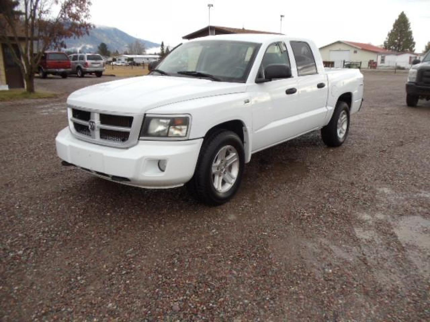 2010 White /Grey Dodge Dakota Bighorn (1D7RW3GP2AS) with an 4.7L V8 SOHC 16V FFV engine, 5-Speed Automatic transmission, located at 5465 Highway 2 W., Columbia Falls, MT, 59912, (406) 892-4407, 48.352188, -114.240929 - 4.7L V8 Cruise AC CD Tilt wheel Towing Power windows door locks and mirrors Brand new tires. - Photo#2