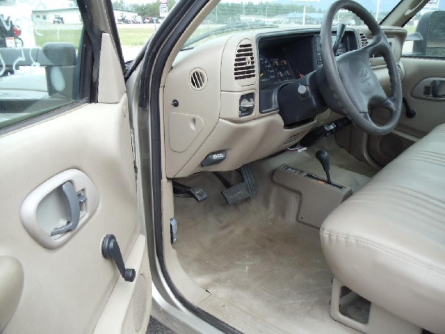 2000 Tan /Tan Chevrolet C/K 2500 Work Truck (1GBGK24R5YF) with an 5.7L V8 OHV 16V engine, Automatic transmission, located at 5465 Highway 2 W., Columbia Falls, MT, 59912, (406) 892-4407, 48.352188, -114.240929 - This truck is equipped with AC only 8 Foot Utility Box Good tires - Photo#16