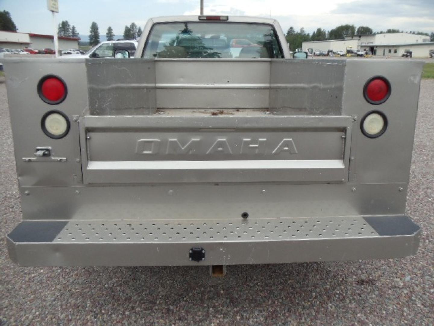 2000 Tan /Tan Chevrolet C/K 2500 Work Truck (1GBGK24R5YF) with an 5.7L V8 OHV 16V engine, Automatic transmission, located at 5465 Highway 2 W., Columbia Falls, MT, 59912, (406) 892-4407, 48.352188, -114.240929 - This truck is equipped with AC only 8 Foot Utility Box Good tires - Photo#5