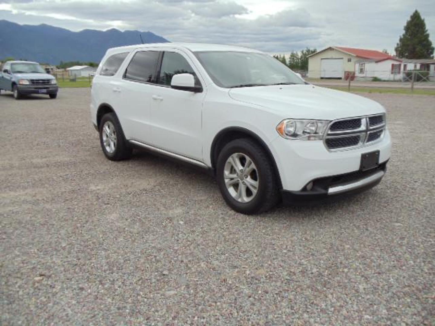 2013 White /Tan Dodge Durango SXT AWD (1C4RDJAG8DC) with an 3.6L V6 DOHC 24V engine, 5-Speed Automatic transmission, located at 5465 Highway 2 W., Columbia Falls, MT, 59912, (406) 892-4407, 48.352188, -114.240929 - Keyless entry Cruise control AC MP3 Tilt wheel Power windows door locks and mirrors Near new tires Front and rear heat and AC - Photo#0