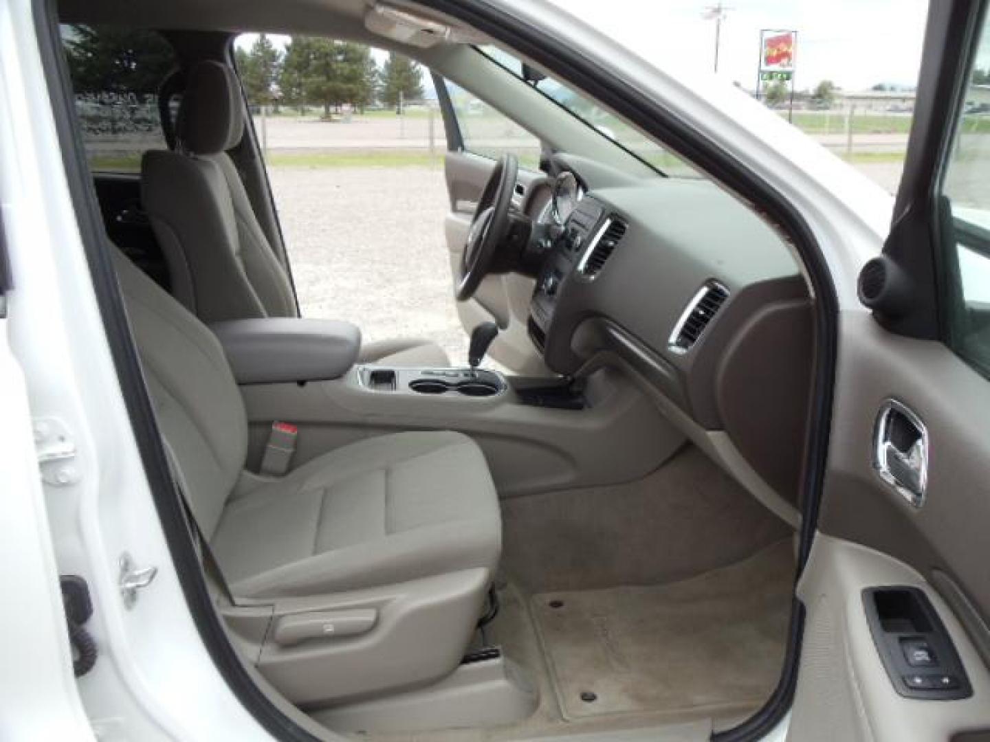 2013 White /Tan Dodge Durango SXT AWD (1C4RDJAG8DC) with an 3.6L V6 DOHC 24V engine, 5-Speed Automatic transmission, located at 5465 Highway 2 W., Columbia Falls, MT, 59912, (406) 892-4407, 48.352188, -114.240929 - Keyless entry Cruise control AC MP3 Tilt wheel Power windows door locks and mirrors Near new tires Front and rear heat and AC - Photo#9