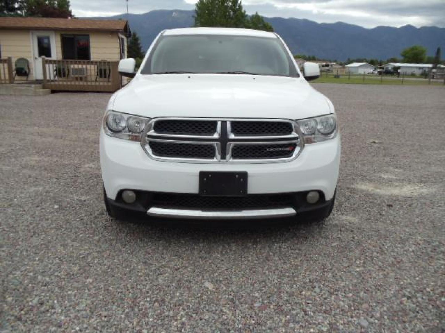 2013 White /Tan Dodge Durango SXT AWD (1C4RDJAG8DC) with an 3.6L V6 DOHC 24V engine, 5-Speed Automatic transmission, located at 5465 Highway 2 W., Columbia Falls, MT, 59912, (406) 892-4407, 48.352188, -114.240929 - Keyless entry Cruise control AC MP3 Tilt wheel Power windows door locks and mirrors Near new tires Front and rear heat and AC - Photo#1