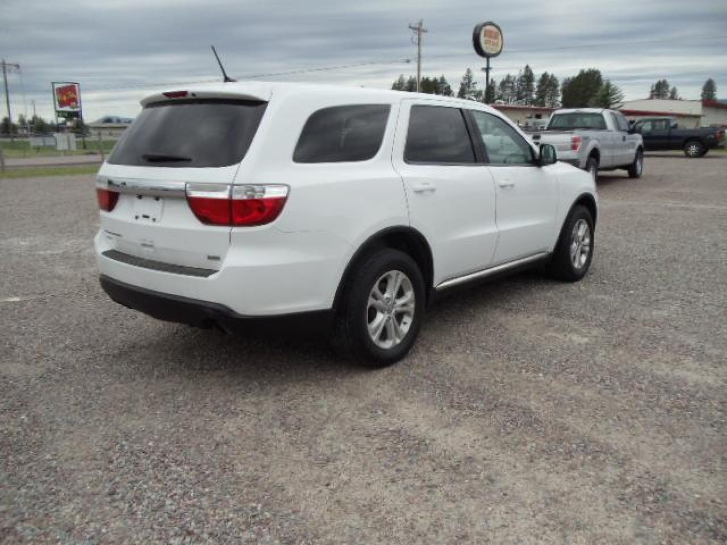 2013 White /Tan Dodge Durango SXT AWD (1C4RDJAG8DC) with an 3.6L V6 DOHC 24V engine, 5-Speed Automatic transmission, located at 5465 Highway 2 W., Columbia Falls, MT, 59912, (406) 892-4407, 48.352188, -114.240929 - Keyless entry Cruise control AC MP3 Tilt wheel Power windows door locks and mirrors Near new tires Front and rear heat and AC - Photo#7