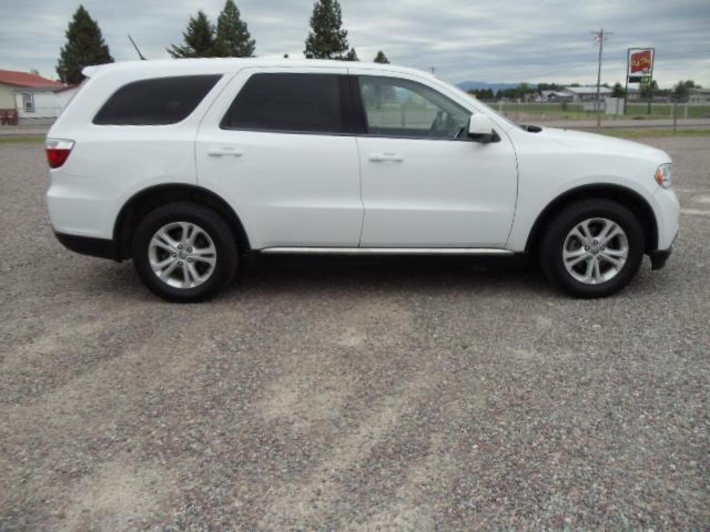 2013 White /Tan Dodge Durango SXT AWD (1C4RDJAG8DC) with an 3.6L V6 DOHC 24V engine, 5-Speed Automatic transmission, located at 5465 Highway 2 W., Columbia Falls, MT, 59912, (406) 892-4407, 48.352188, -114.240929 - Keyless entry Cruise control AC MP3 Tilt wheel Power windows door locks and mirrors Near new tires Front and rear heat and AC - Photo#8