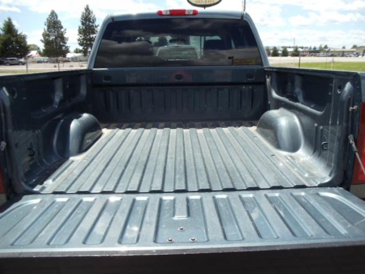 2009 Blue /Gray Chevrolet Silverado 1500 LS Crew Cab 4WD (3GCEK13C59G) with an 4.8L V8 OHV 16V engine, 4-Speed Automatic transmission, located at 5465 Highway 2 W., Columbia Falls, MT, 59912, (406) 892-4407, 48.352188, -114.240929 - Keyless entry Cruise control AC CD Power windows door locks and mirrors Towing 6 Passenger - Photo#7