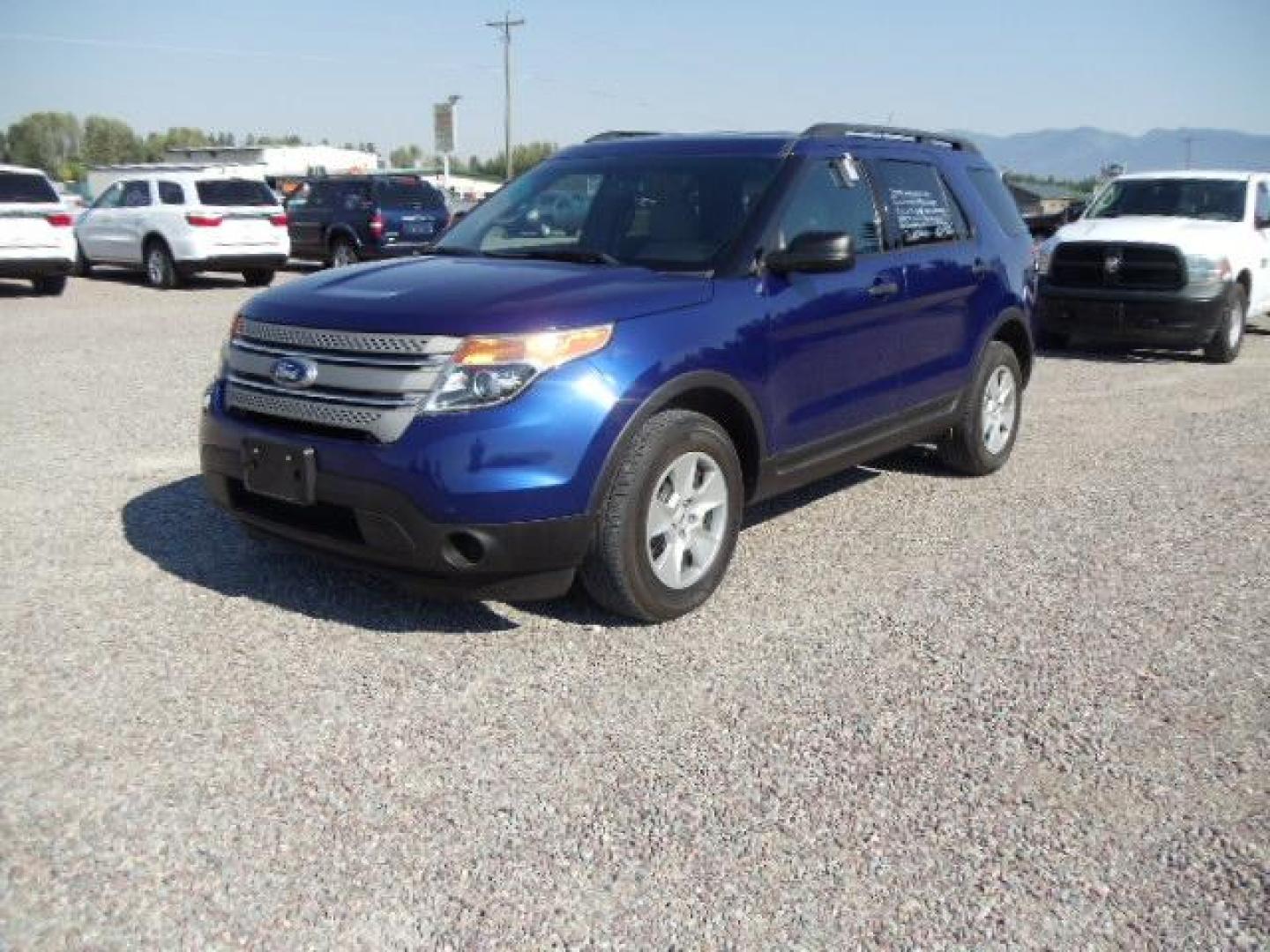 2014 Blue /Silver Ford Explorer Base 4WD (1FM5K8B83EG) with an 3.5L V6 DOHC 24V engine, 6-Speed Automatic transmission, located at 5465 Highway 2 W., Columbia Falls, MT, 59912, (406) 892-4407, 48.352188, -114.240929 - Keyless entry Cruise control AC and heat front and rear Power windows door locks and mirrors Power seat driver side only MP3-CD 3rd Seat Near new tires - Photo#2