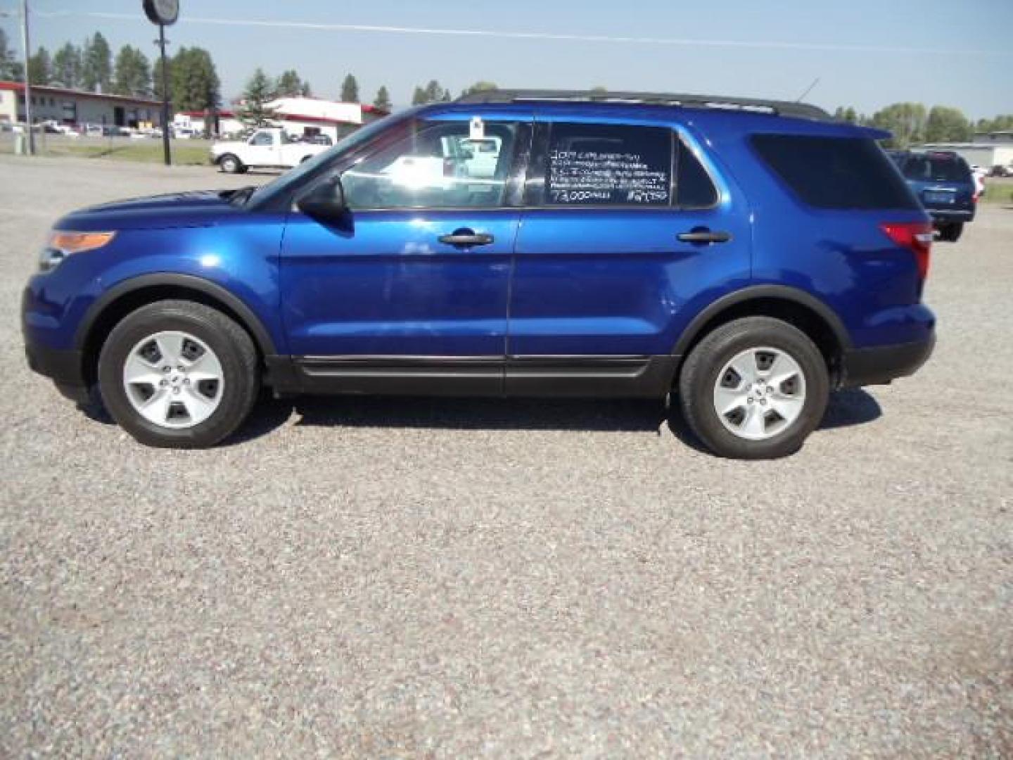 2014 Blue /Silver Ford Explorer Base 4WD (1FM5K8B83EG) with an 3.5L V6 DOHC 24V engine, 6-Speed Automatic transmission, located at 5465 Highway 2 W., Columbia Falls, MT, 59912, (406) 892-4407, 48.352188, -114.240929 - Keyless entry Cruise control AC and heat front and rear Power windows door locks and mirrors Power seat driver side only MP3-CD 3rd Seat Near new tires - Photo#3