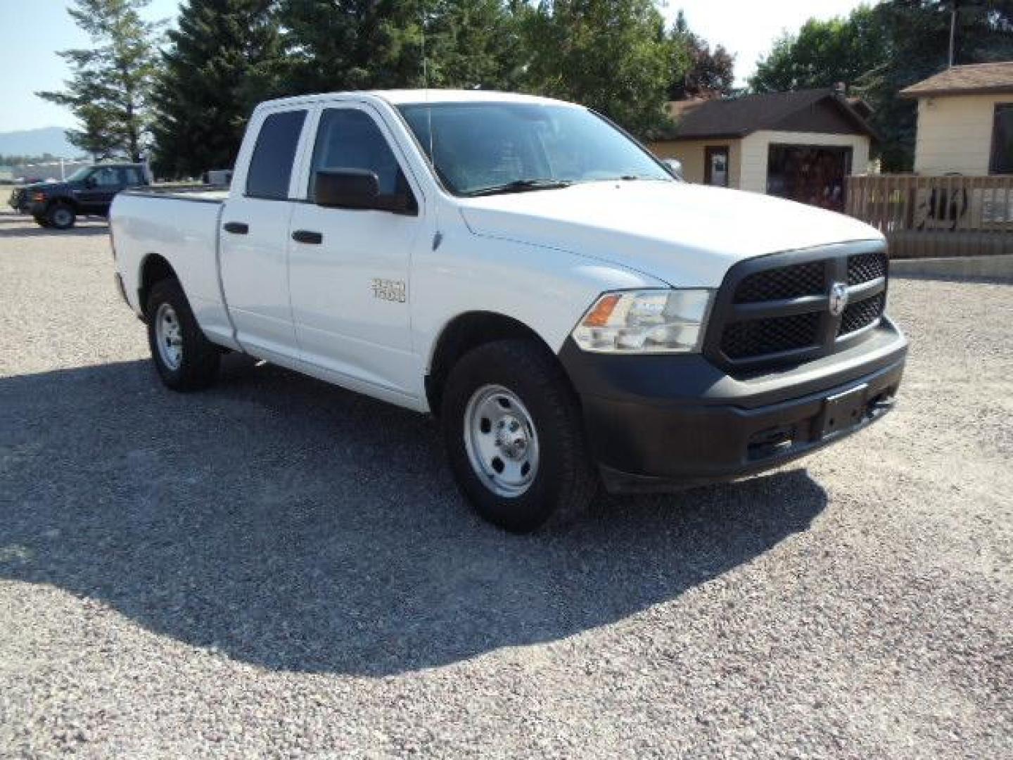 2013 White /Gray Ram 1500 Tradesman Quad Cab 4WD (1C6RR7FG9DS) with an 3.6L V6 engine, 6-Speed Automatic transmission, located at 5465 Highway 2 W., Columbia Falls, MT, 59912, (406) 892-4407, 48.352188, -114.240929 - Cruise control AC Tilt wheel Towing Power windows door locks and mirrors Near new tires Mechanically inspected - Photo#0