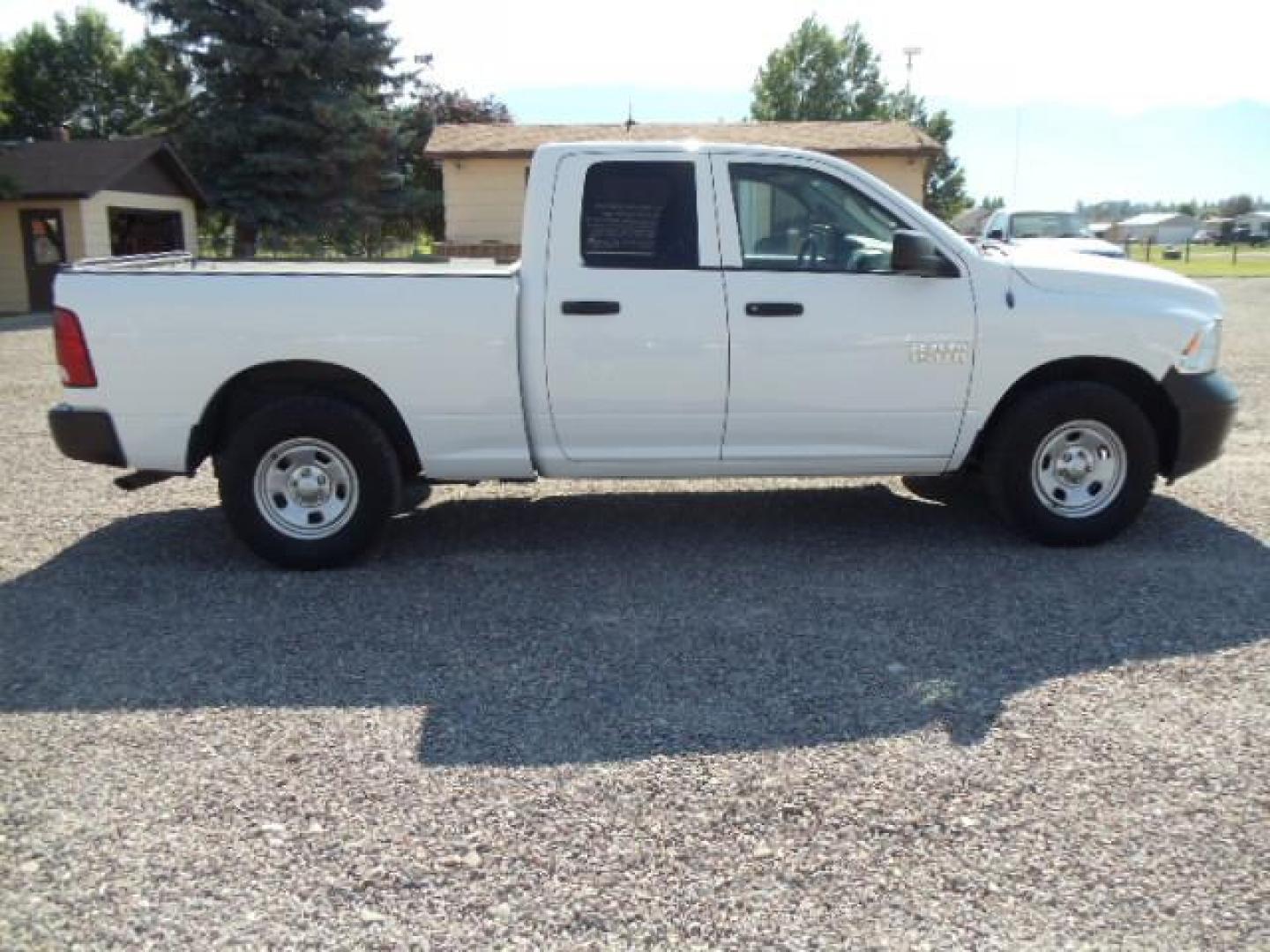 2013 White /Gray Ram 1500 Tradesman Quad Cab 4WD (1C6RR7FG9DS) with an 3.6L V6 engine, 6-Speed Automatic transmission, located at 5465 Highway 2 W., Columbia Falls, MT, 59912, (406) 892-4407, 48.352188, -114.240929 - Cruise control AC Tilt wheel Towing Power windows door locks and mirrors Near new tires Mechanically inspected - Photo#9