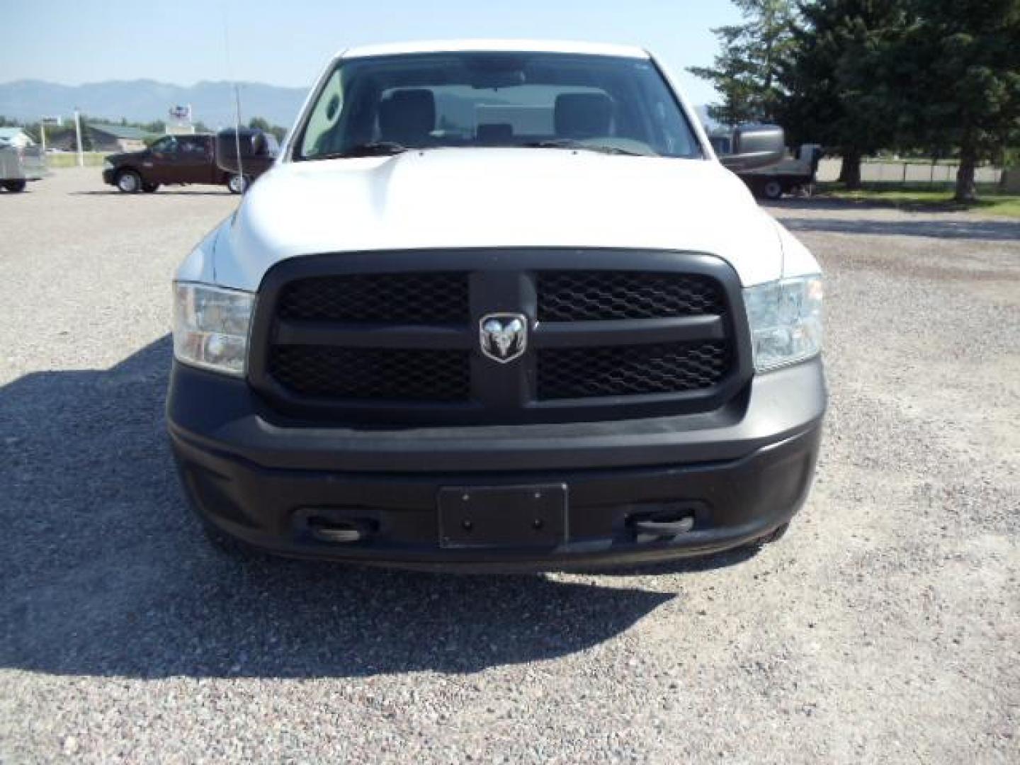 2013 White /Gray Ram 1500 Tradesman Quad Cab 4WD (1C6RR7FG9DS) with an 3.6L V6 engine, 6-Speed Automatic transmission, located at 5465 Highway 2 W., Columbia Falls, MT, 59912, (406) 892-4407, 48.352188, -114.240929 - Cruise control AC Tilt wheel Towing Power windows door locks and mirrors Near new tires Mechanically inspected - Photo#1