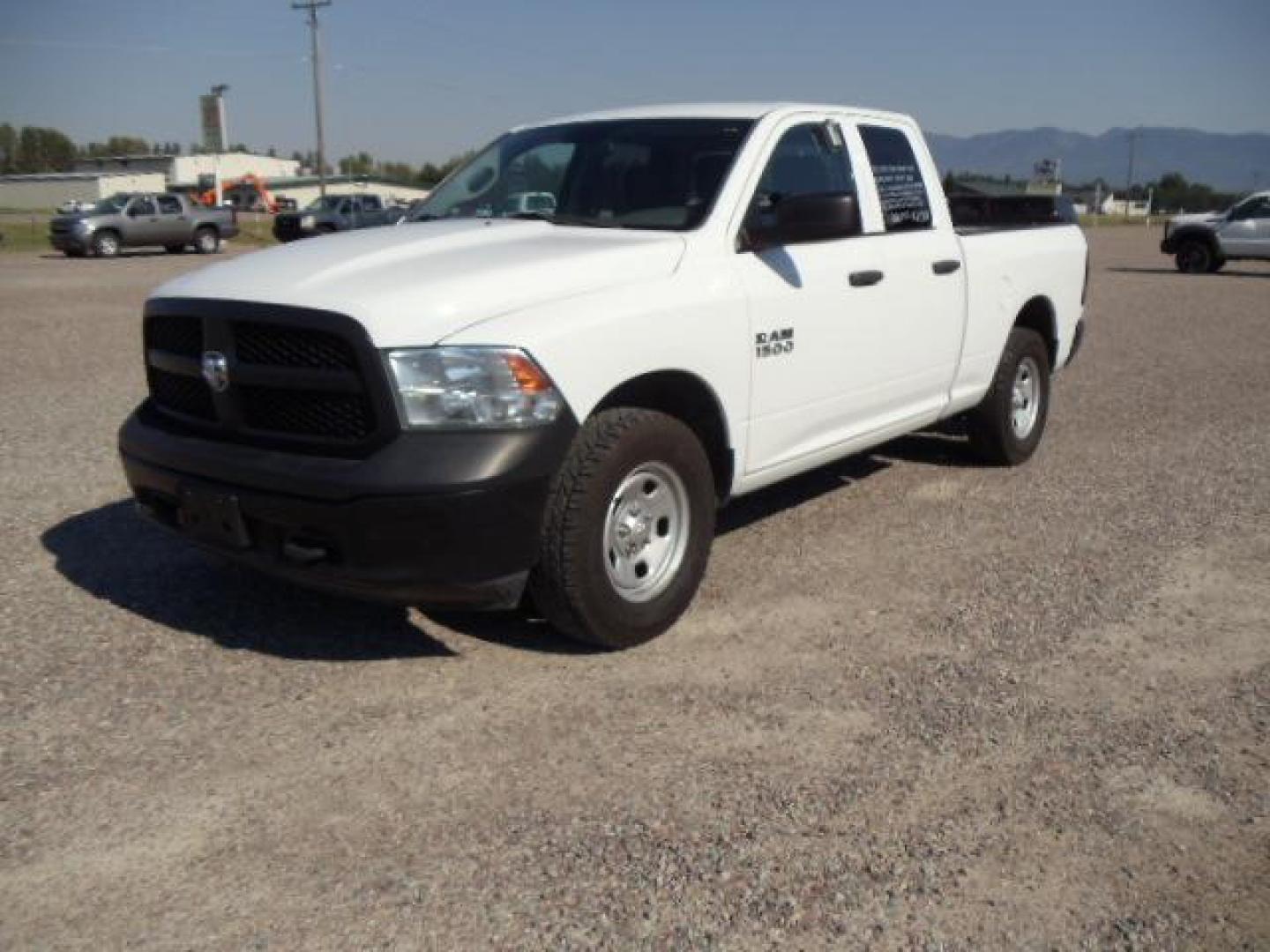 2013 White /Gray Ram 1500 Tradesman Quad Cab 4WD (1C6RR7FG9DS) with an 3.6L V6 engine, 6-Speed Automatic transmission, located at 5465 Highway 2 W., Columbia Falls, MT, 59912, (406) 892-4407, 48.352188, -114.240929 - Cruise control AC Tilt wheel Towing Power windows door locks and mirrors Near new tires Mechanically inspected - Photo#2