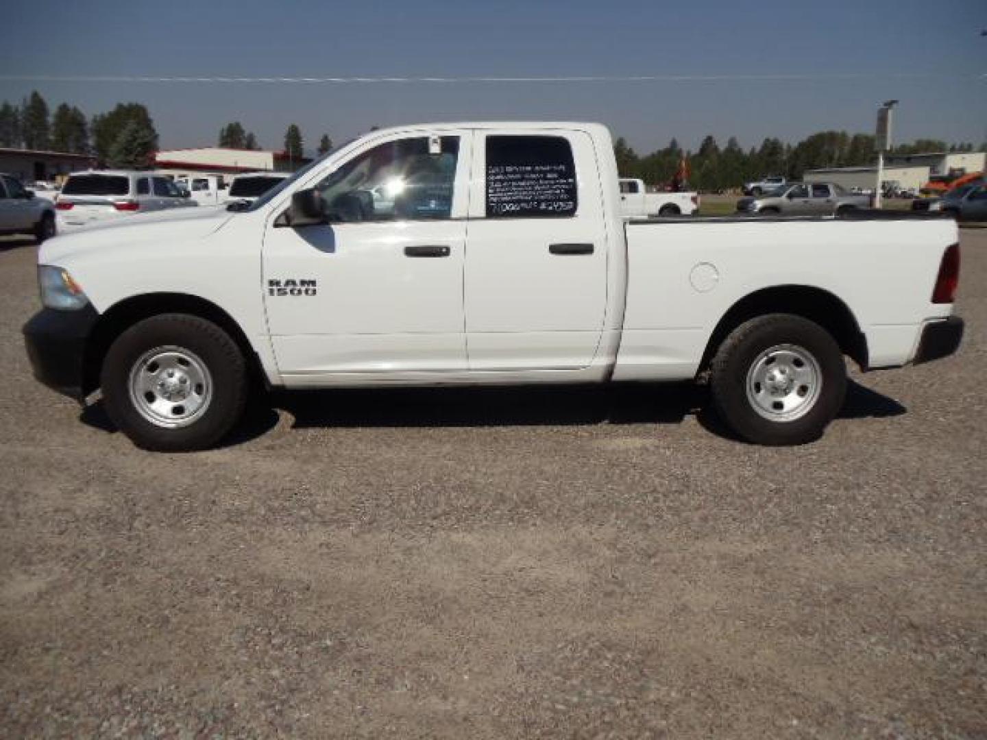 2013 White /Gray Ram 1500 Tradesman Quad Cab 4WD (1C6RR7FG9DS) with an 3.6L V6 engine, 6-Speed Automatic transmission, located at 5465 Highway 2 W., Columbia Falls, MT, 59912, (406) 892-4407, 48.352188, -114.240929 - Cruise control AC Tilt wheel Towing Power windows door locks and mirrors Near new tires Mechanically inspected - Photo#3