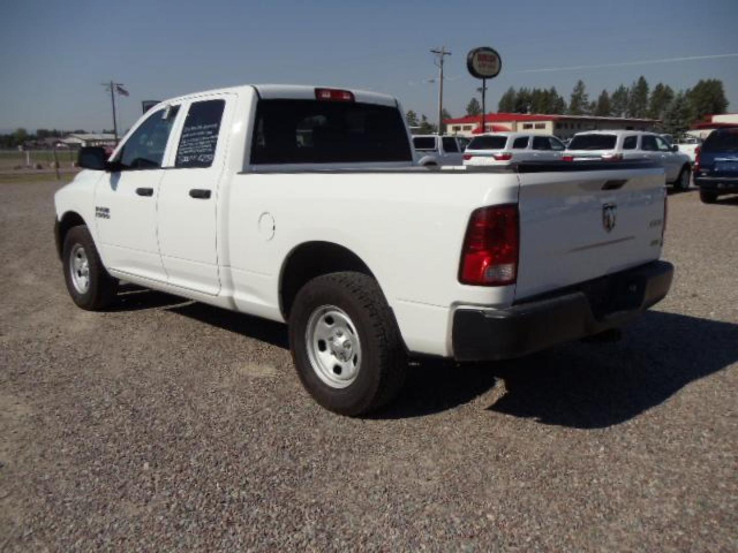 2013 White /Gray Ram 1500 Tradesman Quad Cab 4WD (1C6RR7FG9DS) with an 3.6L V6 engine, 6-Speed Automatic transmission, located at 5465 Highway 2 W., Columbia Falls, MT, 59912, (406) 892-4407, 48.352188, -114.240929 - Cruise control AC Tilt wheel Towing Power windows door locks and mirrors Near new tires Mechanically inspected - Photo#4