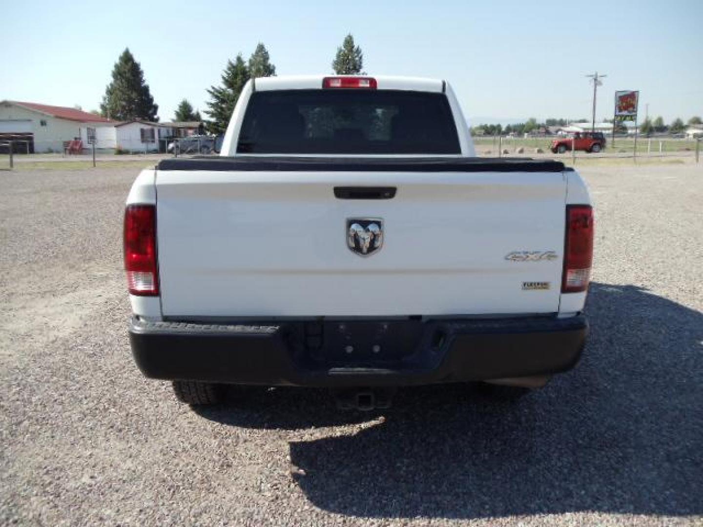 2013 White /Gray Ram 1500 Tradesman Quad Cab 4WD (1C6RR7FG9DS) with an 3.6L V6 engine, 6-Speed Automatic transmission, located at 5465 Highway 2 W., Columbia Falls, MT, 59912, (406) 892-4407, 48.352188, -114.240929 - Cruise control AC Tilt wheel Towing Power windows door locks and mirrors Near new tires Mechanically inspected - Photo#5