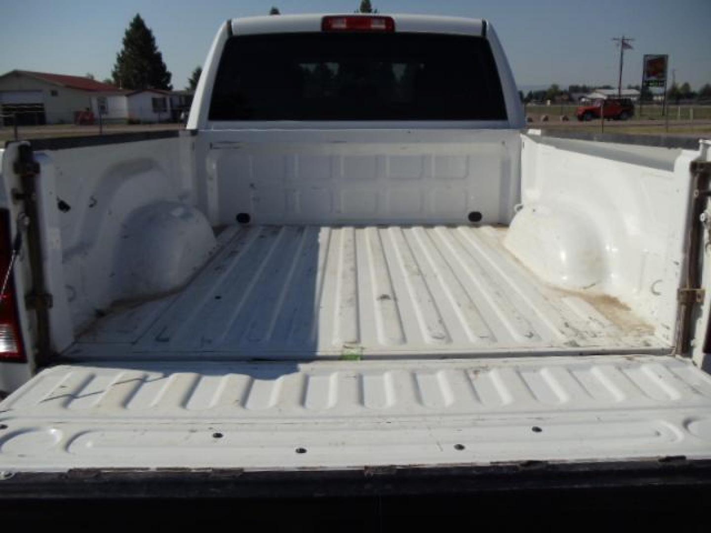 2013 White /Gray Ram 1500 Tradesman Quad Cab 4WD (1C6RR7FG9DS) with an 3.6L V6 engine, 6-Speed Automatic transmission, located at 5465 Highway 2 W., Columbia Falls, MT, 59912, (406) 892-4407, 48.352188, -114.240929 - Cruise control AC Tilt wheel Towing Power windows door locks and mirrors Near new tires Mechanically inspected - Photo#7