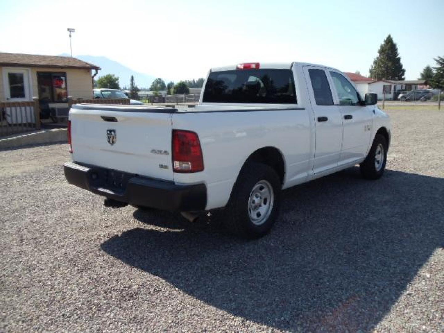 2013 White /Gray Ram 1500 Tradesman Quad Cab 4WD (1C6RR7FG9DS) with an 3.6L V6 engine, 6-Speed Automatic transmission, located at 5465 Highway 2 W., Columbia Falls, MT, 59912, (406) 892-4407, 48.352188, -114.240929 - Cruise control AC Tilt wheel Towing Power windows door locks and mirrors Near new tires Mechanically inspected - Photo#8