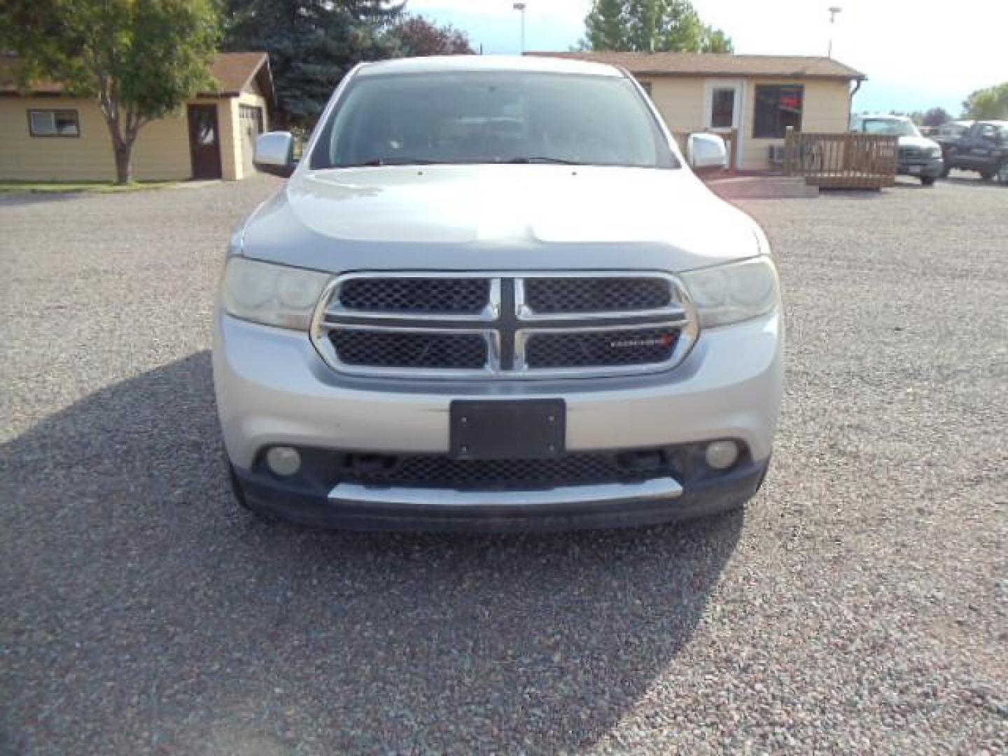 2012 Silver /Silver Dodge Durango SXT AWD (1C4RDJAG3CC) with an 3.6L V6 DOHC 24V engine, 5-Speed Automatic transmission, located at 5465 Highway 2 W., Columbia Falls, MT, 59912, (406) 892-4407, 48.352188, -114.240929 - Keyless entry Cruise control Front and rear heat and AC Power windows door locks and mirrors Tilt wheel - Photo#1