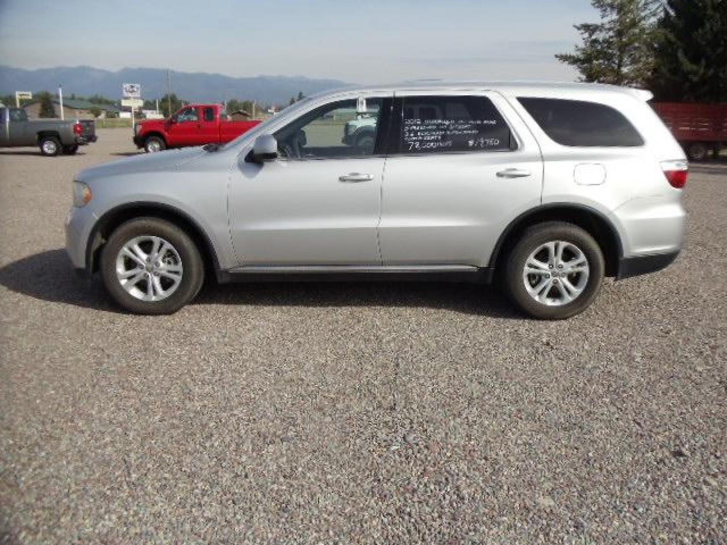 2012 Silver /Silver Dodge Durango SXT AWD (1C4RDJAG3CC) with an 3.6L V6 DOHC 24V engine, 5-Speed Automatic transmission, located at 5465 Highway 2 W., Columbia Falls, MT, 59912, (406) 892-4407, 48.352188, -114.240929 - Keyless entry Cruise control Front and rear heat and AC Power windows door locks and mirrors Tilt wheel - Photo#3