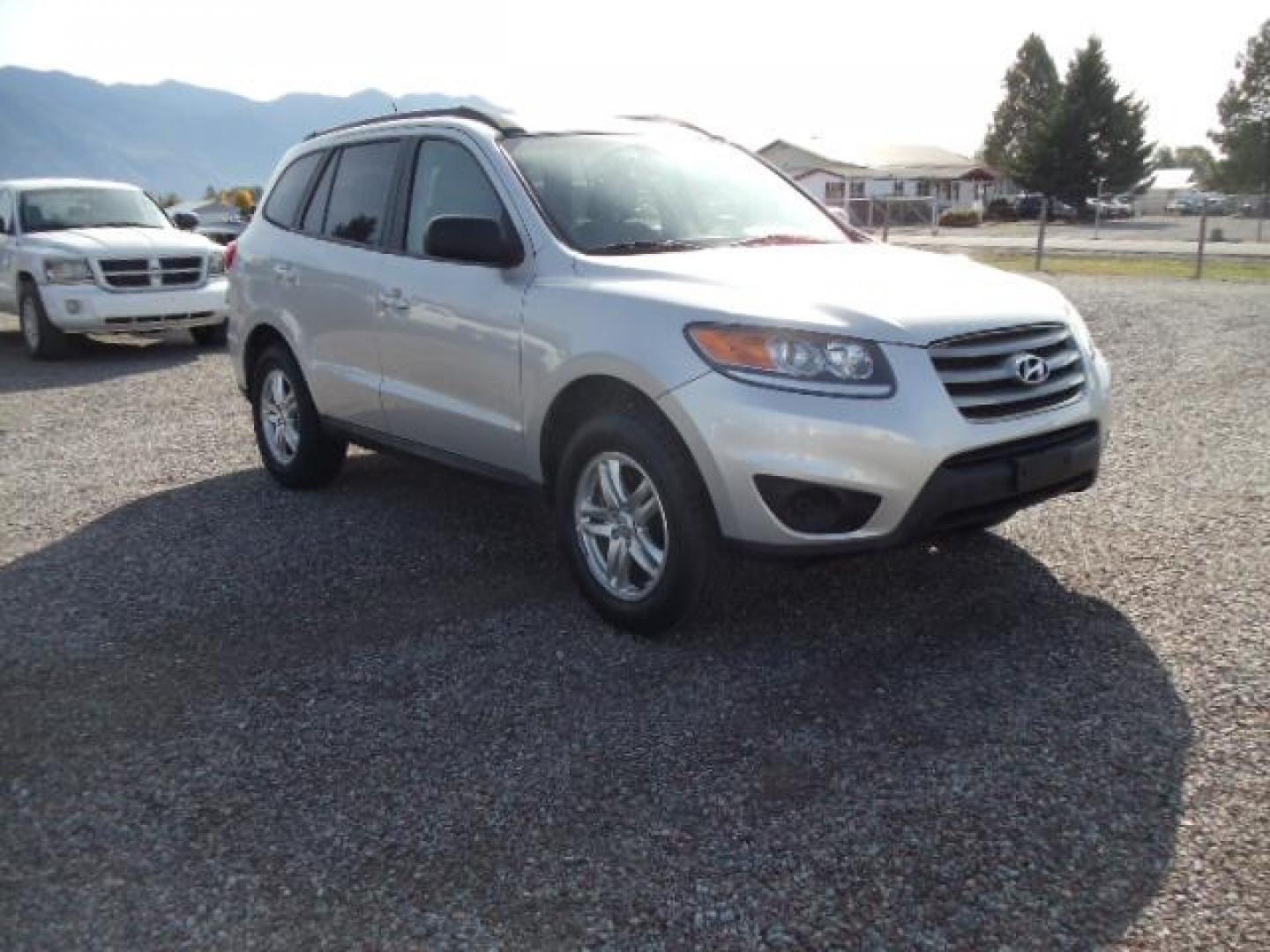 2012 Silver /Gray Hyundai Santa Fe GLS 2.4 4WD (5XYZGDAB4CG) with an 2.4L L4 DOHC 16V engine, 6-Speed Automatic transmission, located at 5465 Highway 2 W., Columbia Falls, MT, 59912, (406) 892-4407, 48.352188, -114.240929 - Keyless entry Cruise control AC Tilt wheel Power windows door locks and mirrors Brand new tires - Photo#0