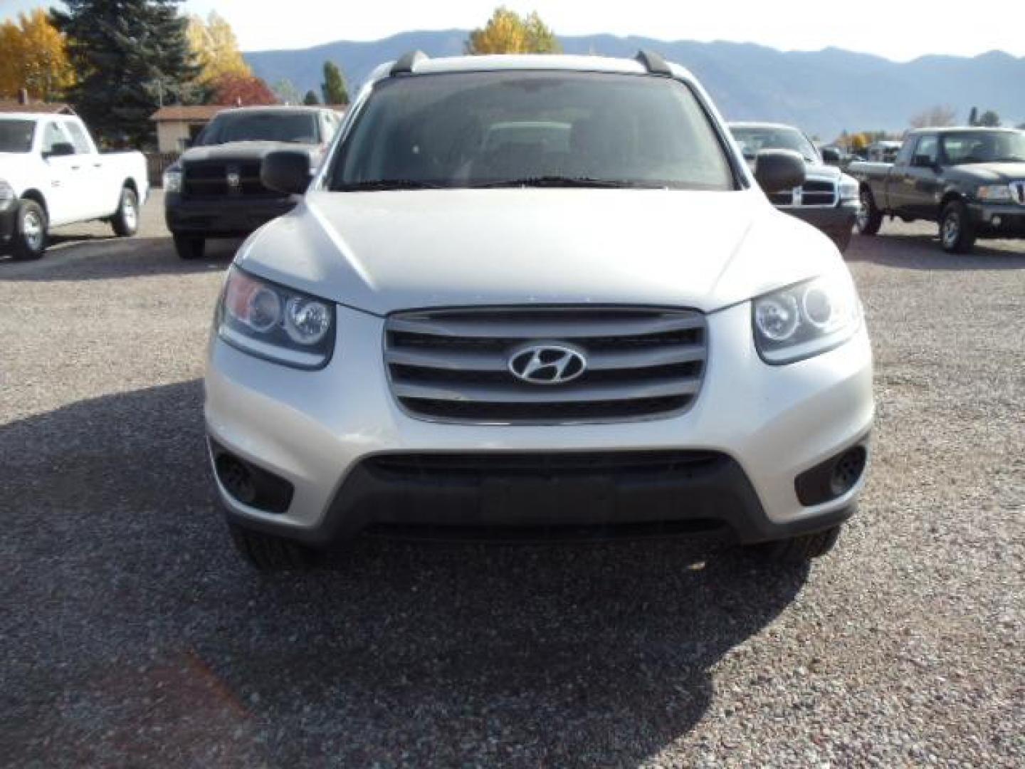 2012 Silver /Gray Hyundai Santa Fe GLS 2.4 4WD (5XYZGDAB4CG) with an 2.4L L4 DOHC 16V engine, 6-Speed Automatic transmission, located at 5465 Highway 2 W., Columbia Falls, MT, 59912, (406) 892-4407, 48.352188, -114.240929 - Keyless entry Cruise control AC Tilt wheel Power windows door locks and mirrors Brand new tires - Photo#1