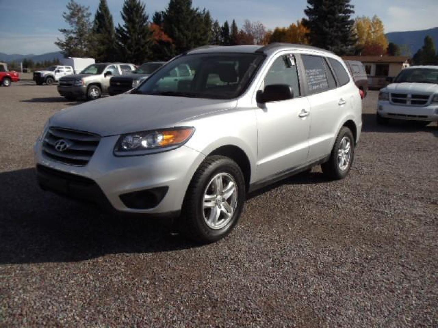 2012 Silver /Gray Hyundai Santa Fe GLS 2.4 4WD (5XYZGDAB4CG) with an 2.4L L4 DOHC 16V engine, 6-Speed Automatic transmission, located at 5465 Highway 2 W., Columbia Falls, MT, 59912, (406) 892-4407, 48.352188, -114.240929 - Keyless entry Cruise control AC Tilt wheel Power windows door locks and mirrors Brand new tires - Photo#2