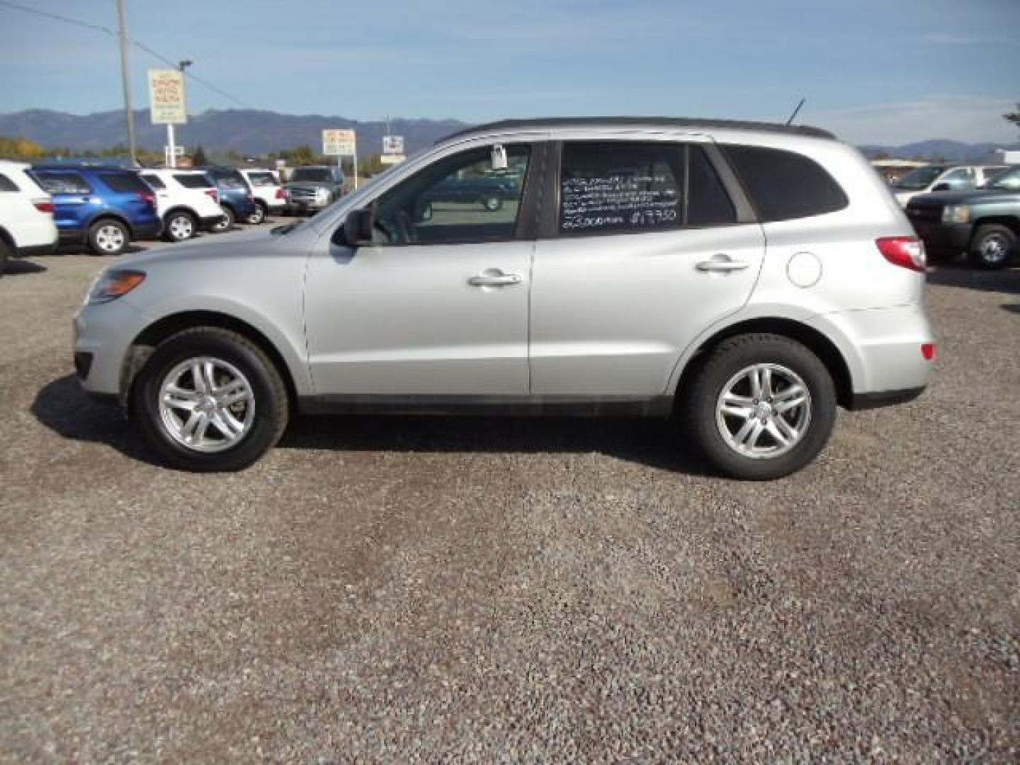 2012 Silver /Gray Hyundai Santa Fe GLS 2.4 4WD (5XYZGDAB4CG) with an 2.4L L4 DOHC 16V engine, 6-Speed Automatic transmission, located at 5465 Highway 2 W., Columbia Falls, MT, 59912, (406) 892-4407, 48.352188, -114.240929 - Keyless entry Cruise control AC Tilt wheel Power windows door locks and mirrors Brand new tires - Photo#3