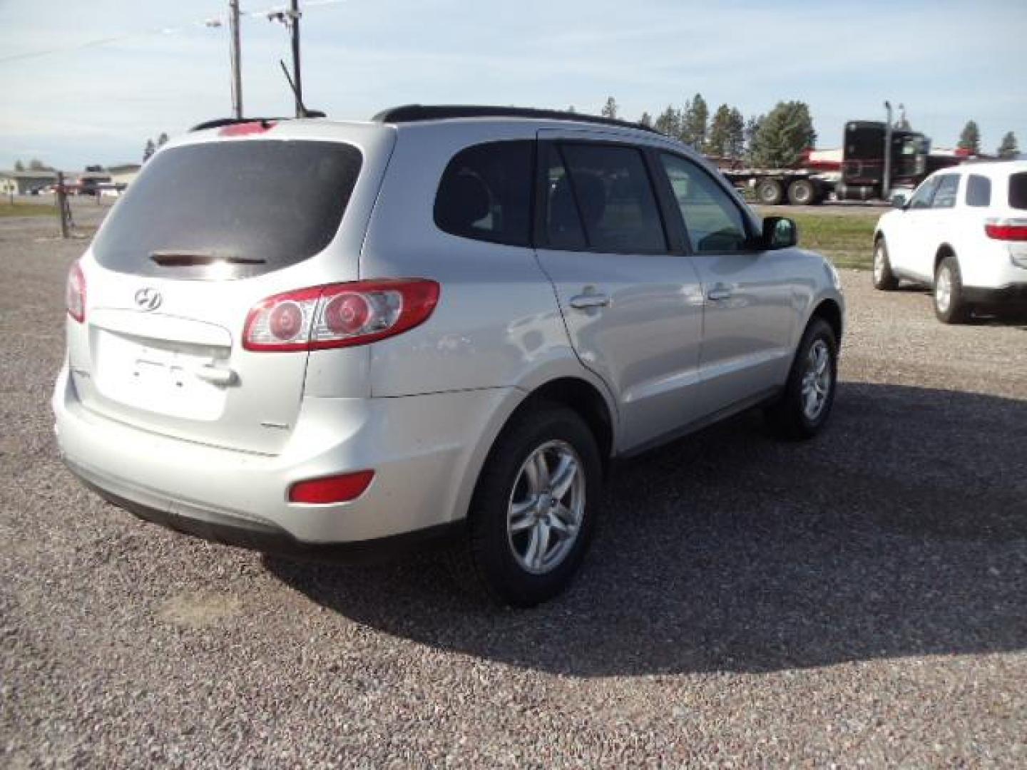 2012 Silver /Gray Hyundai Santa Fe GLS 2.4 4WD (5XYZGDAB4CG) with an 2.4L L4 DOHC 16V engine, 6-Speed Automatic transmission, located at 5465 Highway 2 W., Columbia Falls, MT, 59912, (406) 892-4407, 48.352188, -114.240929 - Keyless entry Cruise control AC Tilt wheel Power windows door locks and mirrors Brand new tires - Photo#8