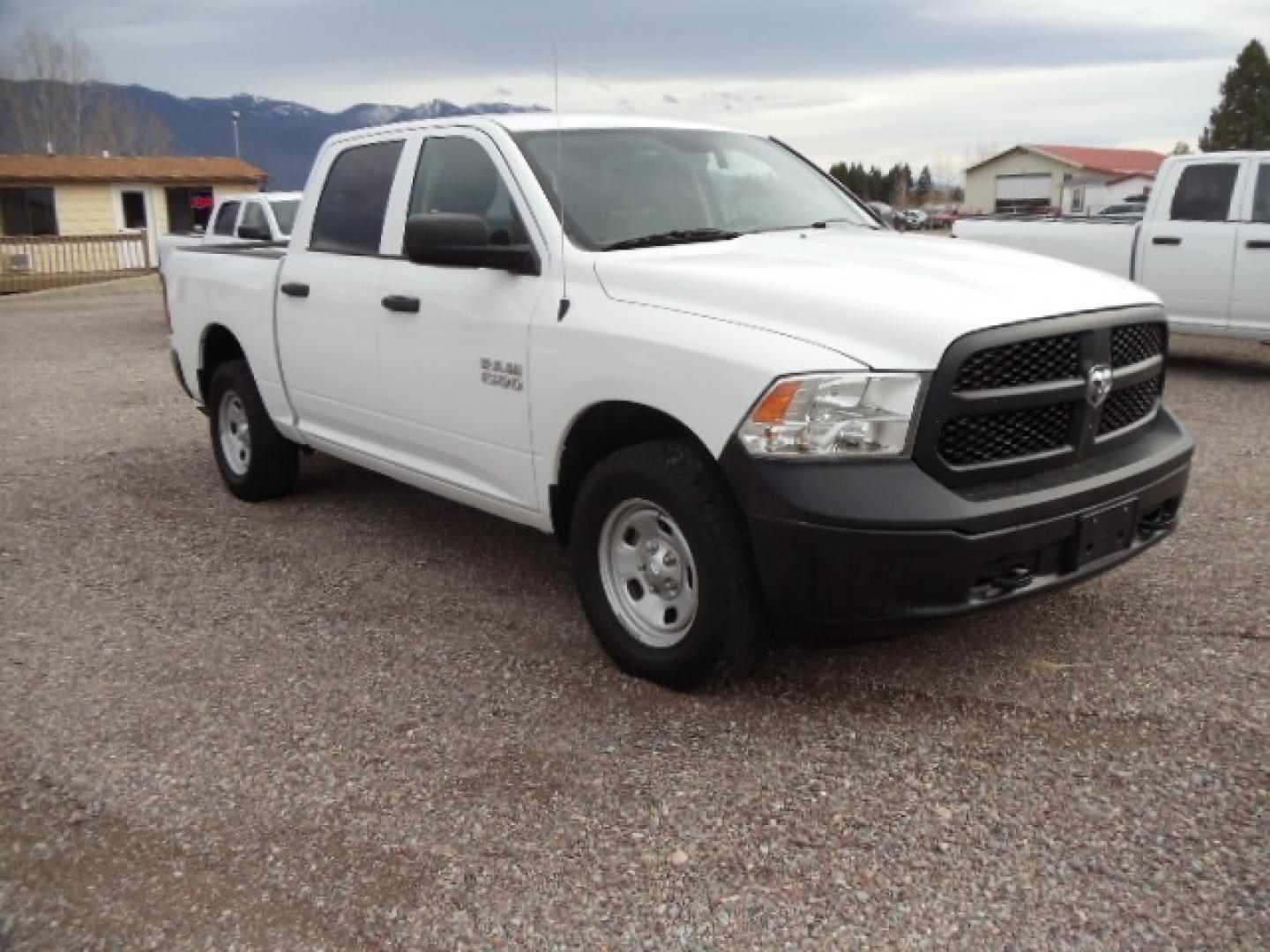 2014 White /Gray RAM 1500 Tradesman Crew Cab SWB 4WD (1C6RR7KG5ES) with an 3.6L V6 DOHC 24V FFV engine, 6-Speed Automatic transmission, located at 5465 Highway 2 W., Columbia Falls, MT, 59912, (406) 892-4407, 48.352188, -114.240929 - Keyless entry, Power windows, Power door locks, Power mirrors, Cruise control, AC, MP3-CD, Towing, Tilt steering wheel. This vehicle was previously owned by the federal government so it has been well maintained and taken care of. The truck is very clean inside and out with good tires and low actua - Photo#0