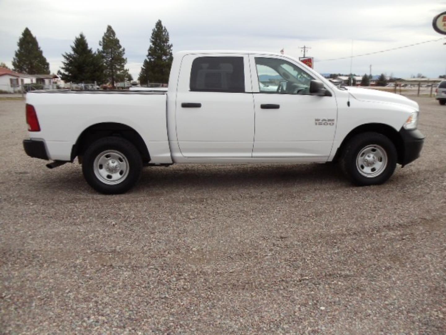 2014 White /Gray RAM 1500 Tradesman Crew Cab SWB 4WD (1C6RR7KG5ES) with an 3.6L V6 DOHC 24V FFV engine, 6-Speed Automatic transmission, located at 5465 Highway 2 W., Columbia Falls, MT, 59912, (406) 892-4407, 48.352188, -114.240929 - Keyless entry, Power windows, Power door locks, Power mirrors, Cruise control, AC, MP3-CD, Towing, Tilt steering wheel. This vehicle was previously owned by the federal government so it has been well maintained and taken care of. The truck is very clean inside and out with good tires and low actua - Photo#9