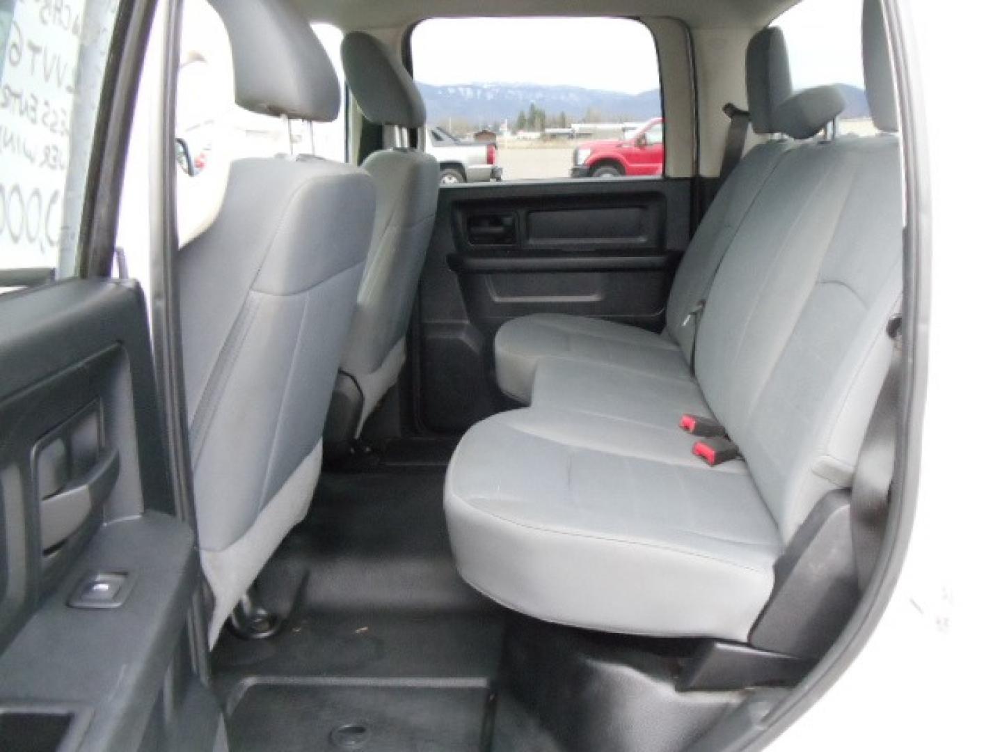 2014 White /Gray RAM 1500 Tradesman Crew Cab SWB 4WD (1C6RR7KG5ES) with an 3.6L V6 DOHC 24V FFV engine, 6-Speed Automatic transmission, located at 5465 Highway 2 W., Columbia Falls, MT, 59912, (406) 892-4407, 48.352188, -114.240929 - Keyless entry, Power windows, Power door locks, Power mirrors, Cruise control, AC, MP3-CD, Towing, Tilt steering wheel. This vehicle was previously owned by the federal government so it has been well maintained and taken care of. The truck is very clean inside and out with good tires and low actua - Photo#15