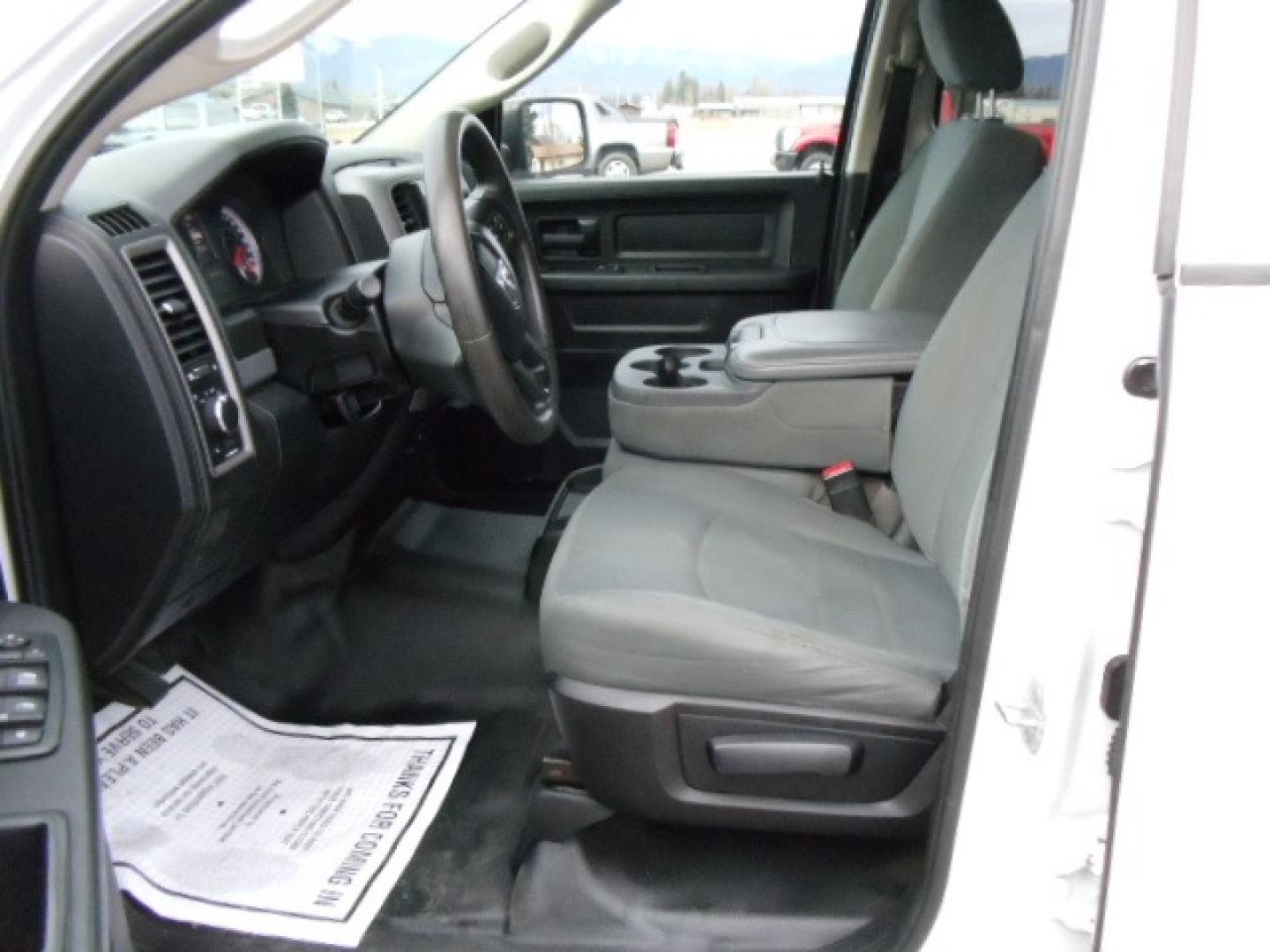 2014 White /Gray RAM 1500 Tradesman Crew Cab SWB 4WD (1C6RR7KG5ES) with an 3.6L V6 DOHC 24V FFV engine, 6-Speed Automatic transmission, located at 5465 Highway 2 W., Columbia Falls, MT, 59912, (406) 892-4407, 48.352188, -114.240929 - Keyless entry, Power windows, Power door locks, Power mirrors, Cruise control, AC, MP3-CD, Towing, Tilt steering wheel. This vehicle was previously owned by the federal government so it has been well maintained and taken care of. The truck is very clean inside and out with good tires and low actua - Photo#16