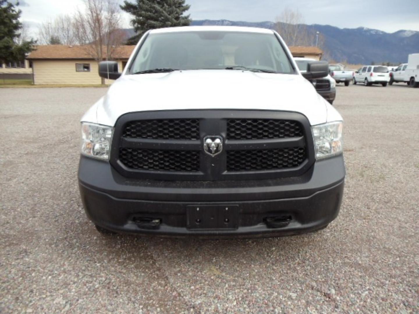 2014 White /Gray RAM 1500 Tradesman Crew Cab SWB 4WD (1C6RR7KG5ES) with an 3.6L V6 DOHC 24V FFV engine, 6-Speed Automatic transmission, located at 5465 Highway 2 W., Columbia Falls, MT, 59912, (406) 892-4407, 48.352188, -114.240929 - Keyless entry, Power windows, Power door locks, Power mirrors, Cruise control, AC, MP3-CD, Towing, Tilt steering wheel. This vehicle was previously owned by the federal government so it has been well maintained and taken care of. The truck is very clean inside and out with good tires and low actua - Photo#1