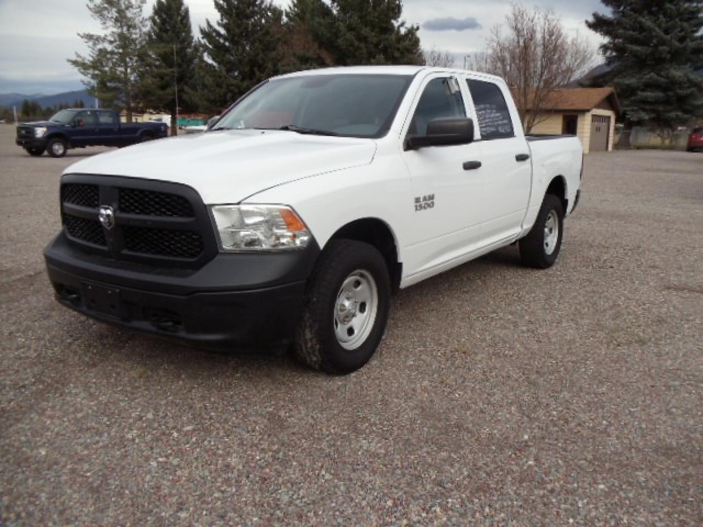 2014 White /Gray RAM 1500 Tradesman Crew Cab SWB 4WD (1C6RR7KG5ES) with an 3.6L V6 DOHC 24V FFV engine, 6-Speed Automatic transmission, located at 5465 Highway 2 W., Columbia Falls, MT, 59912, (406) 892-4407, 48.352188, -114.240929 - Keyless entry, Power windows, Power door locks, Power mirrors, Cruise control, AC, MP3-CD, Towing, Tilt steering wheel. This vehicle was previously owned by the federal government so it has been well maintained and taken care of. The truck is very clean inside and out with good tires and low actua - Photo#2