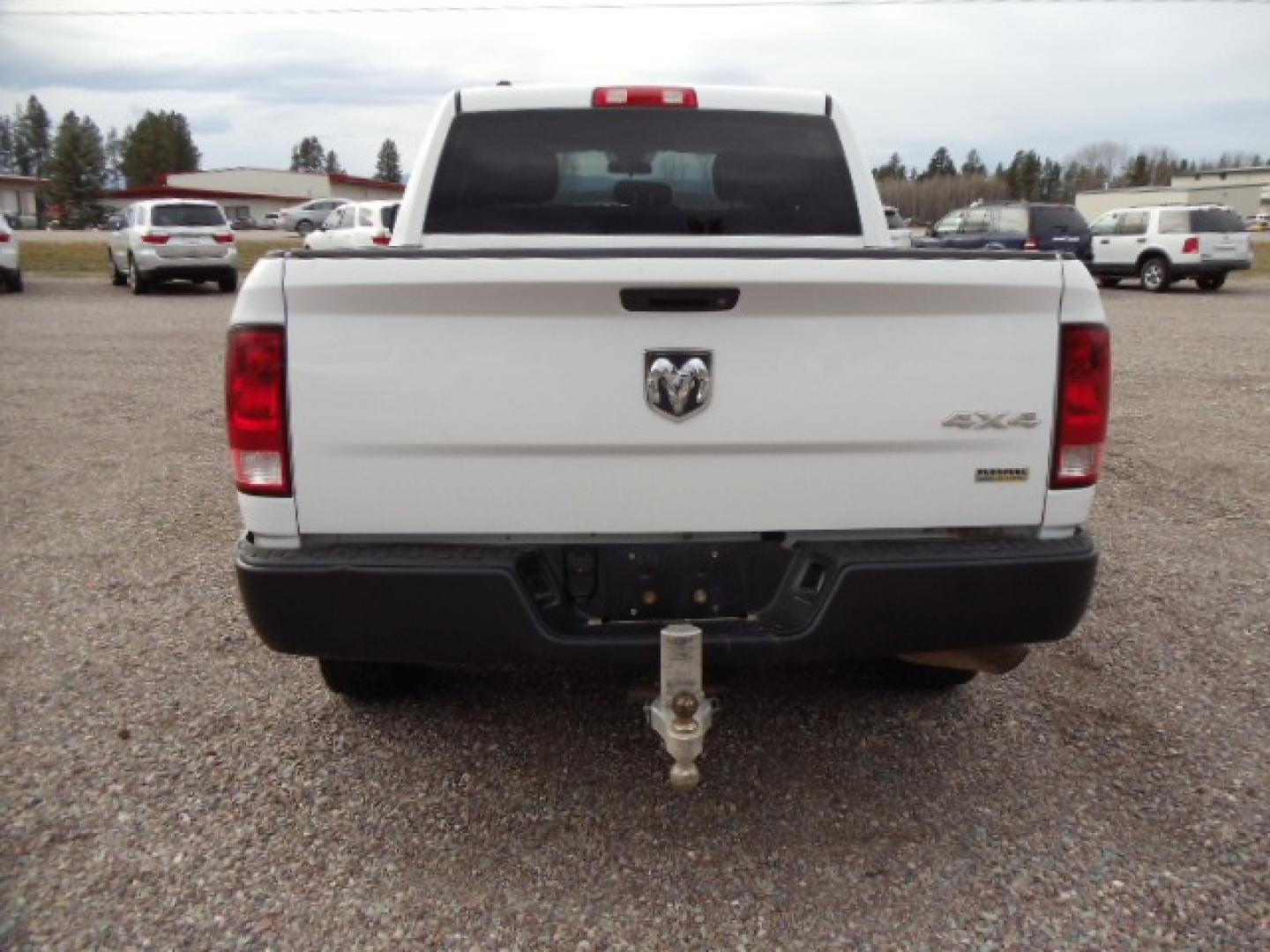 2014 White /Gray RAM 1500 Tradesman Crew Cab SWB 4WD (1C6RR7KG5ES) with an 3.6L V6 DOHC 24V FFV engine, 6-Speed Automatic transmission, located at 5465 Highway 2 W., Columbia Falls, MT, 59912, (406) 892-4407, 48.352188, -114.240929 - Keyless entry, Power windows, Power door locks, Power mirrors, Cruise control, AC, MP3-CD, Towing, Tilt steering wheel. This vehicle was previously owned by the federal government so it has been well maintained and taken care of. The truck is very clean inside and out with good tires and low actua - Photo#5