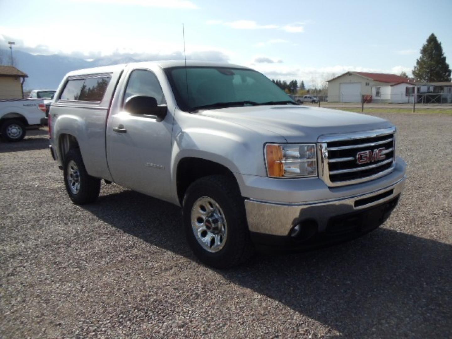 2013 Silver /Grey GMC Sierra 1500 Work Truck 4WD (1GTN2TEXXDZ) with an 4.3L V6 OHV 12V engine, 6-Speed Automatic transmission, located at 5465 Highway 2 W., Columbia Falls, MT, 59912, (406) 892-4407, 48.352188, -114.240929 - This truck is a local trade in. The truck is clean inside and out with near new tires and low actual miles. - Photo#0