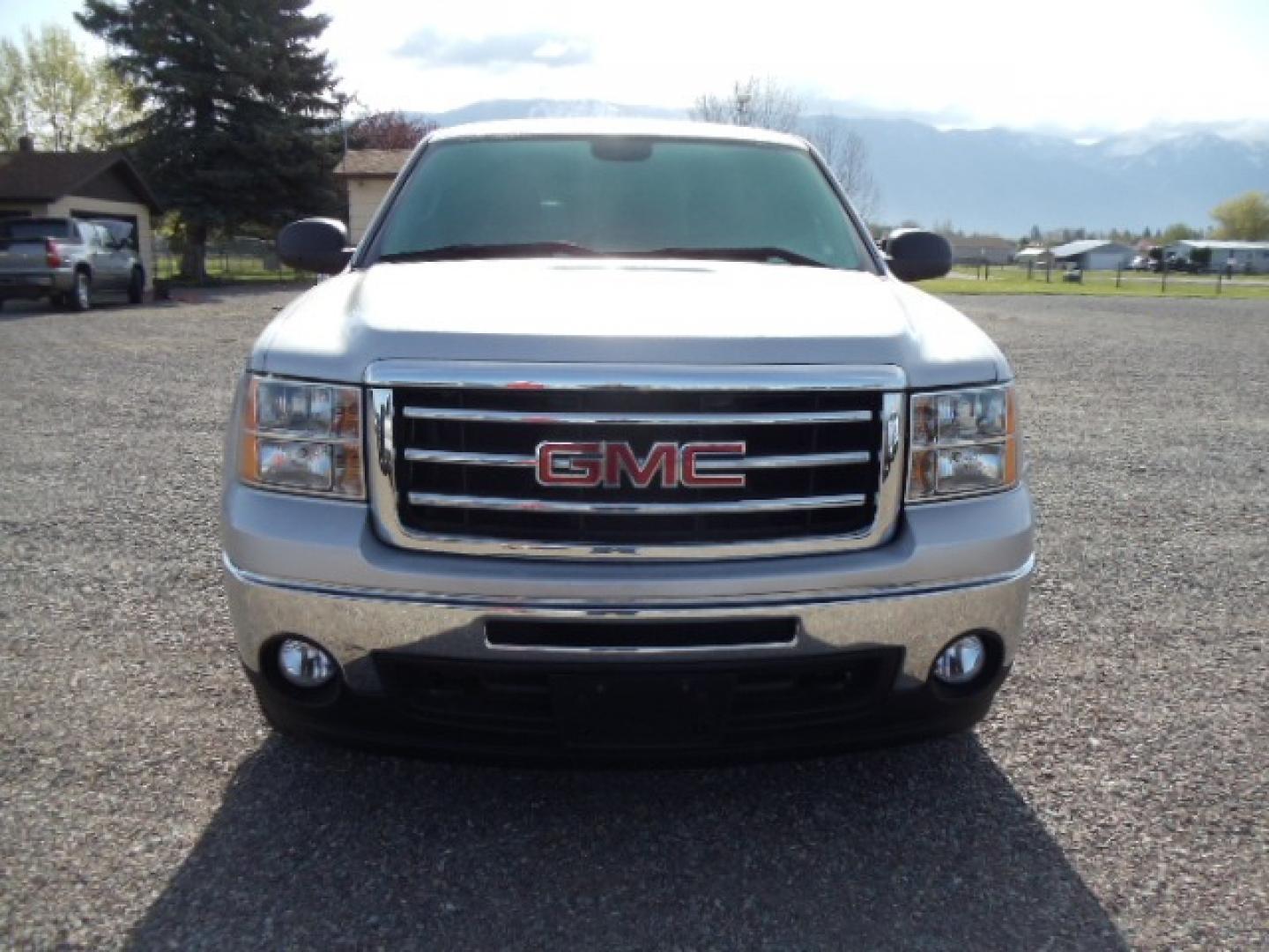 2013 Silver /Grey GMC Sierra 1500 Work Truck 4WD (1GTN2TEXXDZ) with an 4.3L V6 OHV 12V engine, 6-Speed Automatic transmission, located at 5465 Highway 2 W., Columbia Falls, MT, 59912, (406) 892-4407, 48.352188, -114.240929 - This truck is a local trade in. The truck is clean inside and out with near new tires and low actual miles. - Photo#1