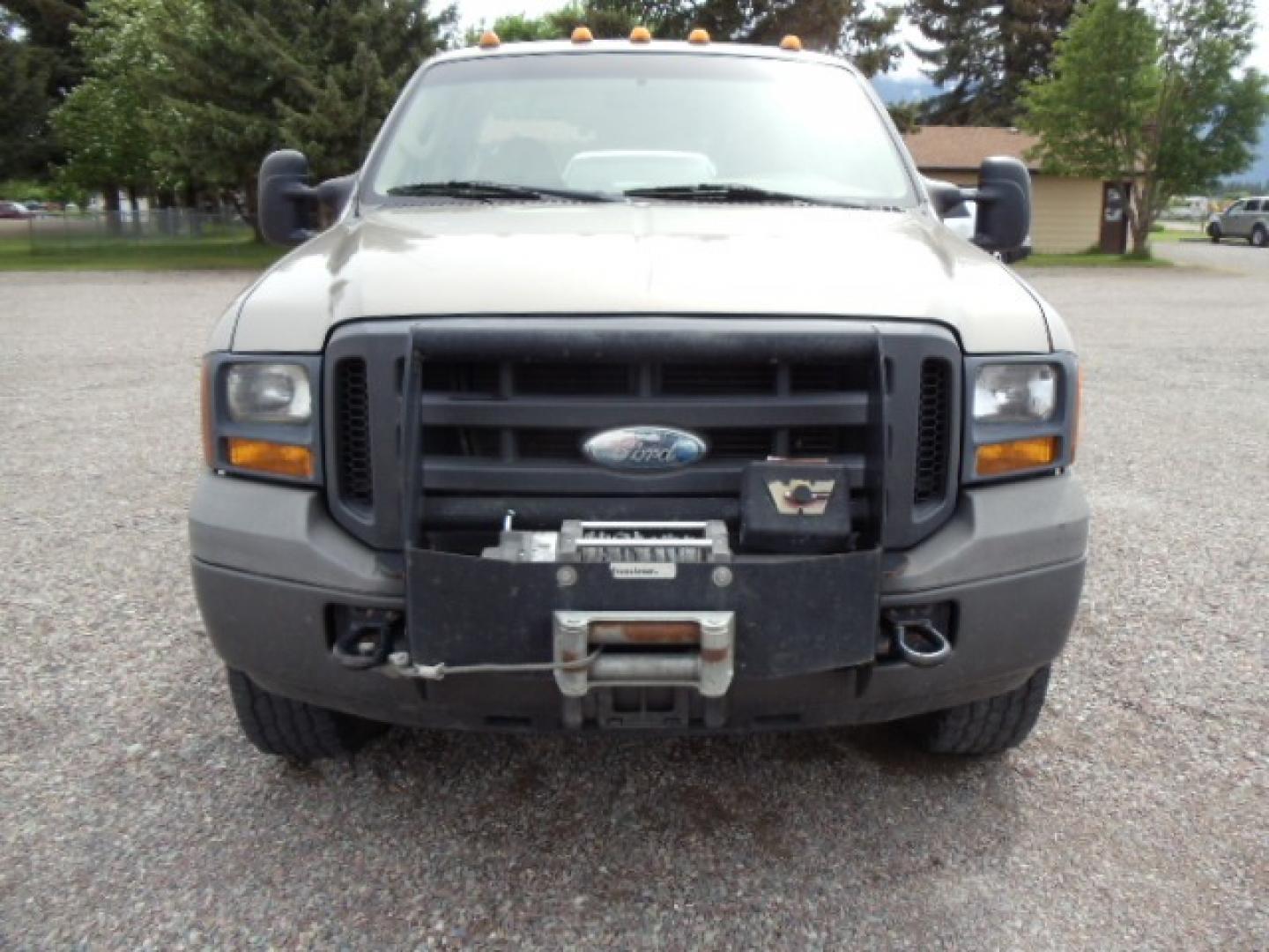 2005 Tan /Tan Ford F-350 SD Lariat SuperCab 4WD (1FDSX35Y05E) with an 6.8L V10 SOHC 30V engine, Automatic transmission, located at 5465 Highway 2 W., Columbia Falls, MT, 59912, (406) 892-4407, 48.352188, -114.240929 - Photo#1