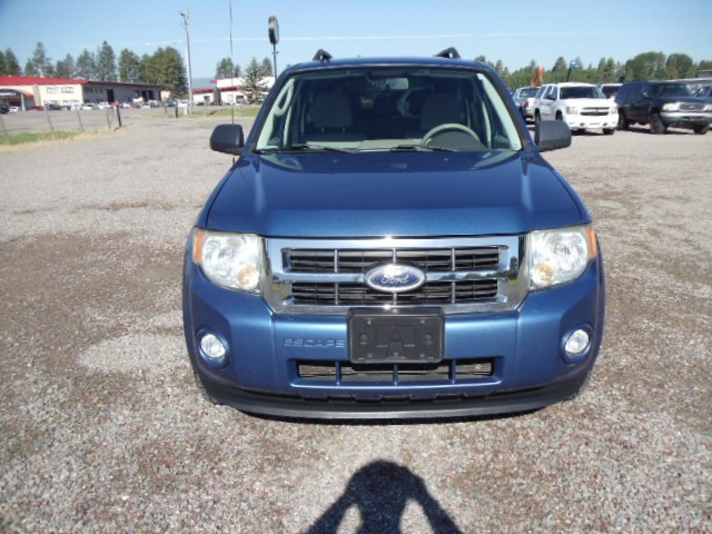 2010 Blue /Silver Ford Escape XLT 4WD (1FMCU9DGXAK) with an 3.0L V6 DOHC 24V engine, 6-Speed Automatic transmission, located at 5465 Highway 2 W., Columbia Falls, MT, 59912, (406) 892-4407, 48.352188, -114.240929 - Photo#1