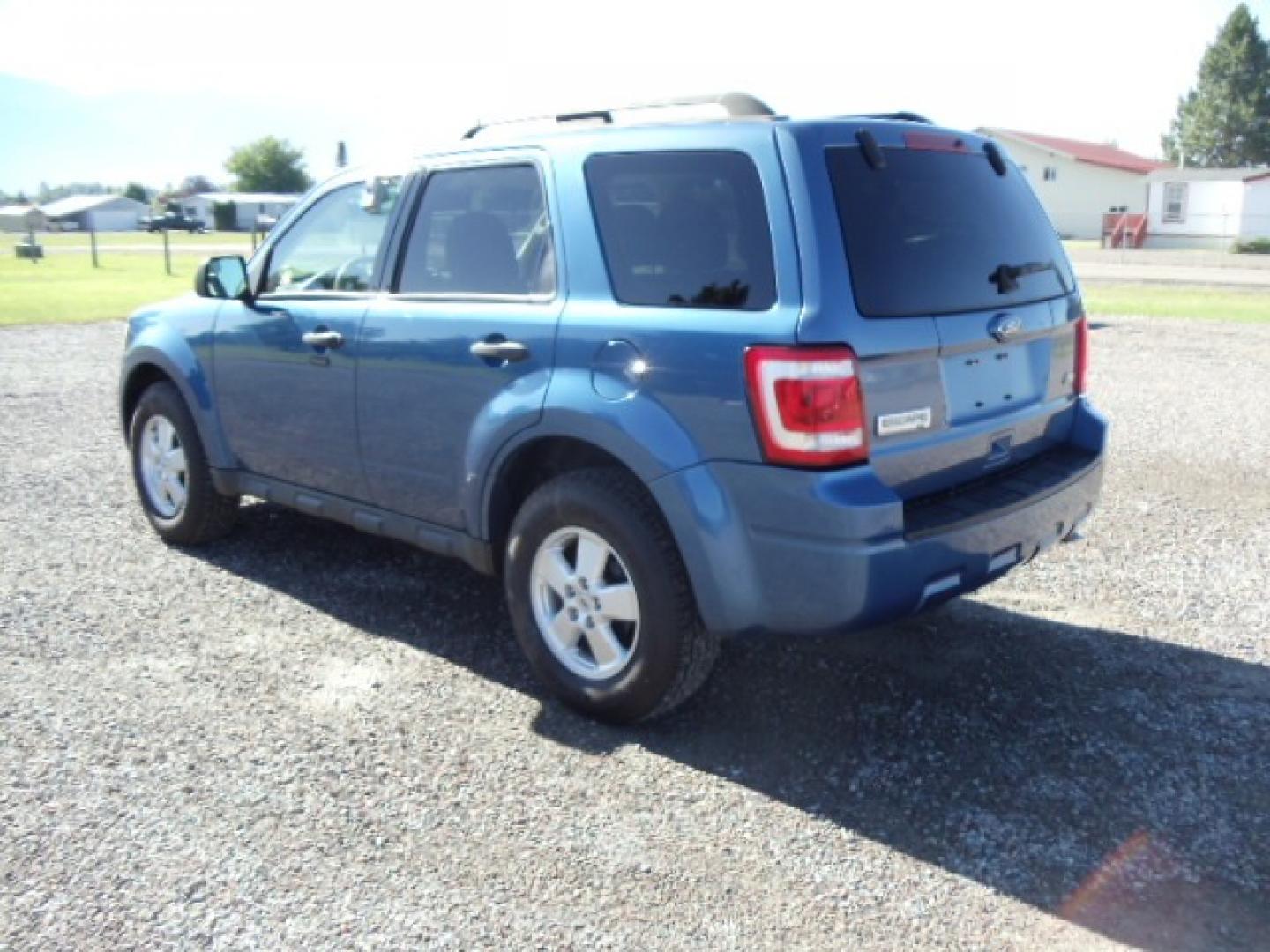 2010 Blue /Silver Ford Escape XLT 4WD (1FMCU9DGXAK) with an 3.0L V6 DOHC 24V engine, 6-Speed Automatic transmission, located at 5465 Highway 2 W., Columbia Falls, MT, 59912, (406) 892-4407, 48.352188, -114.240929 - Photo#4