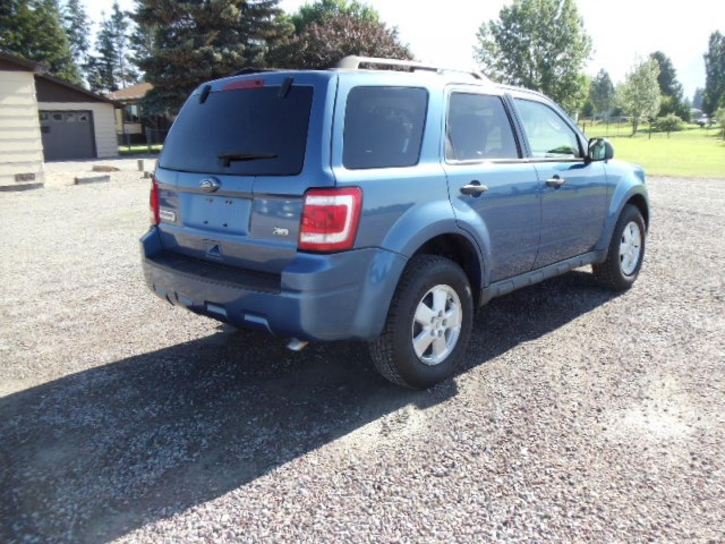 2010 Blue /Silver Ford Escape XLT 4WD (1FMCU9DGXAK) with an 3.0L V6 DOHC 24V engine, 6-Speed Automatic transmission, located at 5465 Highway 2 W., Columbia Falls, MT, 59912, (406) 892-4407, 48.352188, -114.240929 - Photo#6