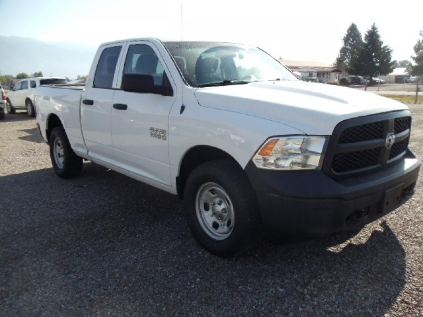 2018 White /Grey RAM 1500 Tradesman Quad Cab 4WD (1C6RR7FG1JS) with an 3.6L V6 DOHC 24V FFV engine, 8A transmission, located at 5465 Highway 2 W., Columbia Falls, MT, 59912, (406) 892-4407, 48.352188, -114.240929 - Photo#0