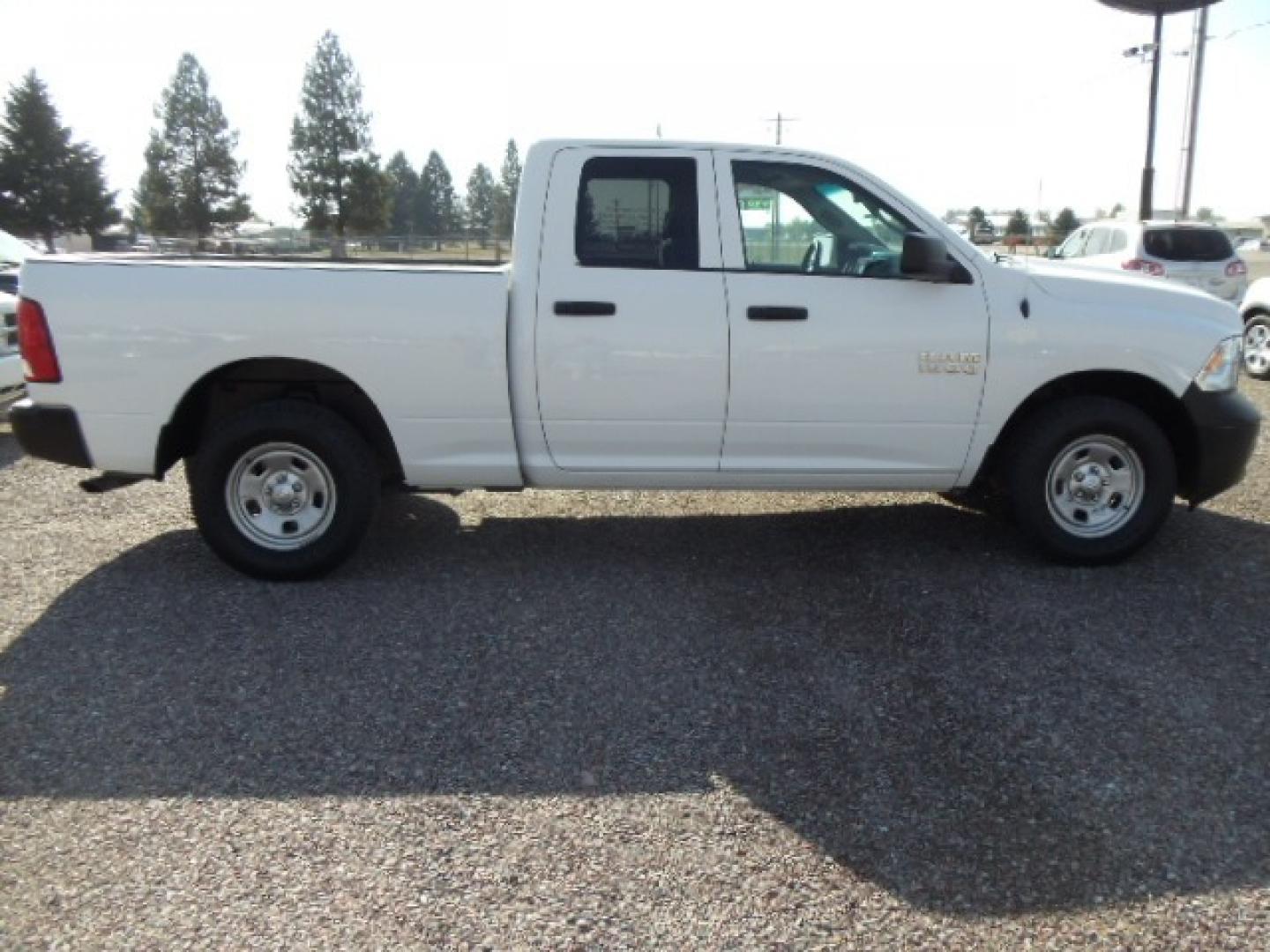 2018 White /Grey RAM 1500 Tradesman Quad Cab 4WD (1C6RR7FG1JS) with an 3.6L V6 DOHC 24V FFV engine, 8A transmission, located at 5465 Highway 2 W., Columbia Falls, MT, 59912, (406) 892-4407, 48.352188, -114.240929 - Photo#9