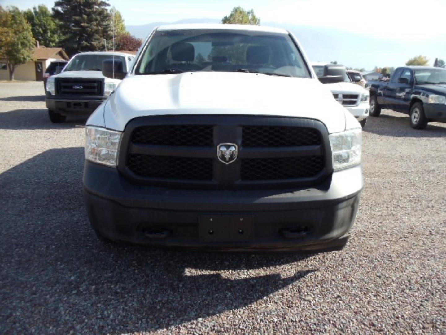 2018 White /Grey RAM 1500 Tradesman Quad Cab 4WD (1C6RR7FG1JS) with an 3.6L V6 DOHC 24V FFV engine, 8A transmission, located at 5465 Highway 2 W., Columbia Falls, MT, 59912, (406) 892-4407, 48.352188, -114.240929 - Photo#1