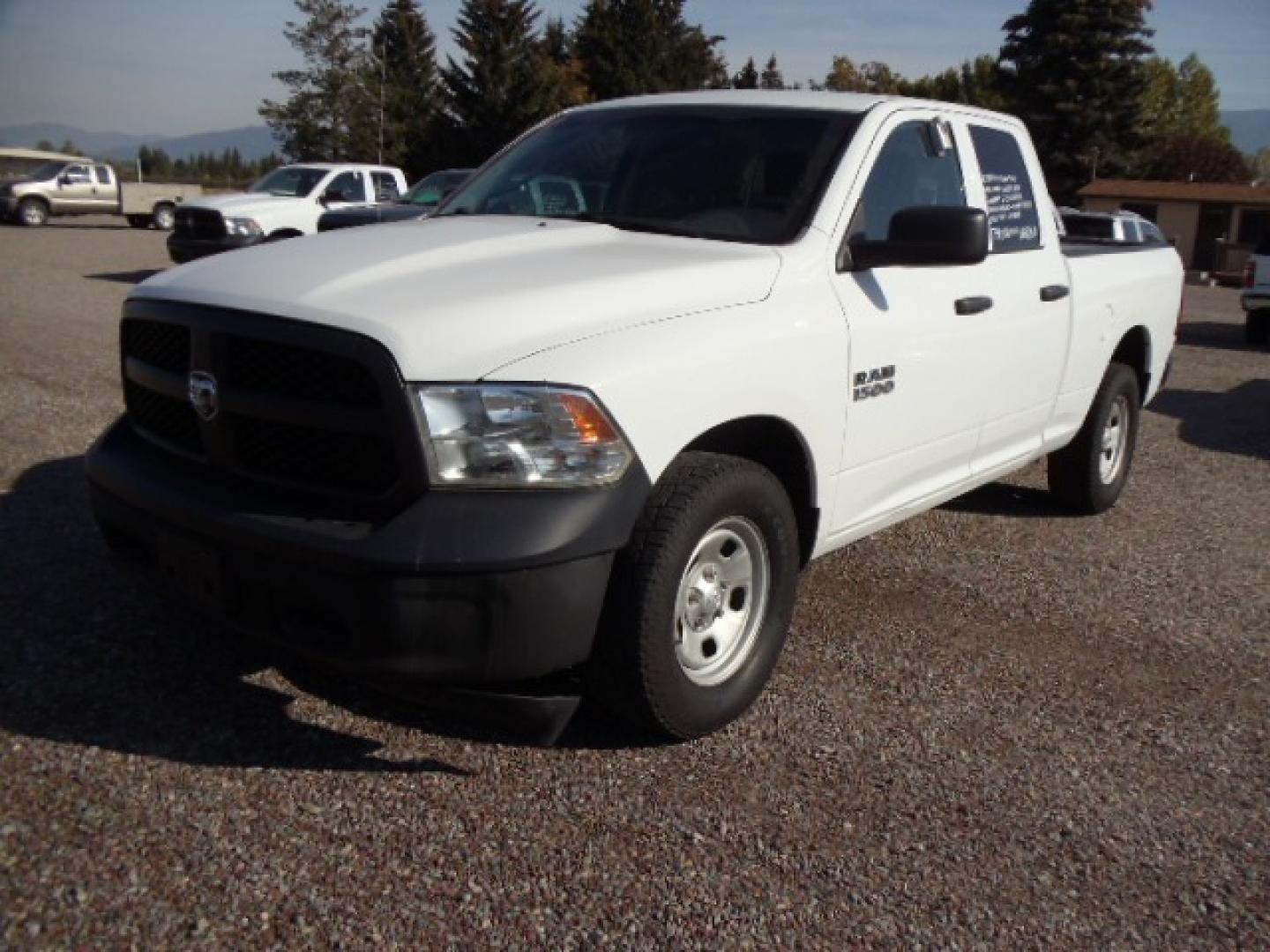 2018 White /Grey RAM 1500 Tradesman Quad Cab 4WD (1C6RR7FG1JS) with an 3.6L V6 DOHC 24V FFV engine, 8A transmission, located at 5465 Highway 2 W., Columbia Falls, MT, 59912, (406) 892-4407, 48.352188, -114.240929 - Photo#2