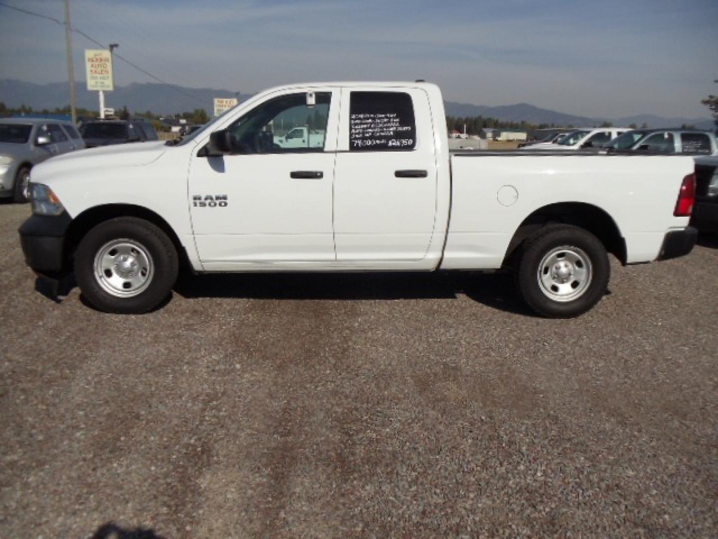 2018 White /Grey RAM 1500 Tradesman Quad Cab 4WD (1C6RR7FG1JS) with an 3.6L V6 DOHC 24V FFV engine, 8A transmission, located at 5465 Highway 2 W., Columbia Falls, MT, 59912, (406) 892-4407, 48.352188, -114.240929 - Photo#3