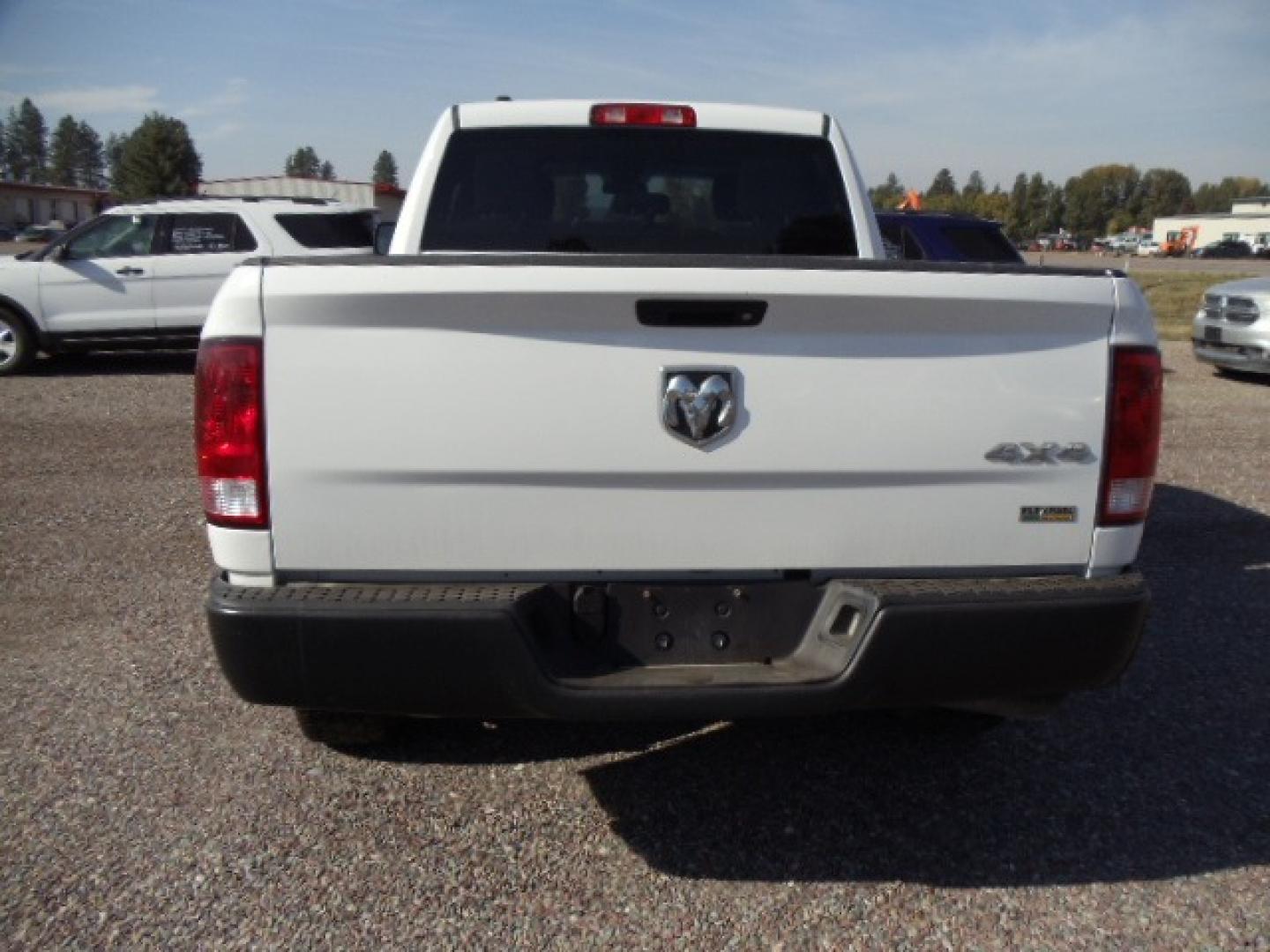 2018 White /Grey RAM 1500 Tradesman Quad Cab 4WD (1C6RR7FG1JS) with an 3.6L V6 DOHC 24V FFV engine, 8A transmission, located at 5465 Highway 2 W., Columbia Falls, MT, 59912, (406) 892-4407, 48.352188, -114.240929 - Photo#5