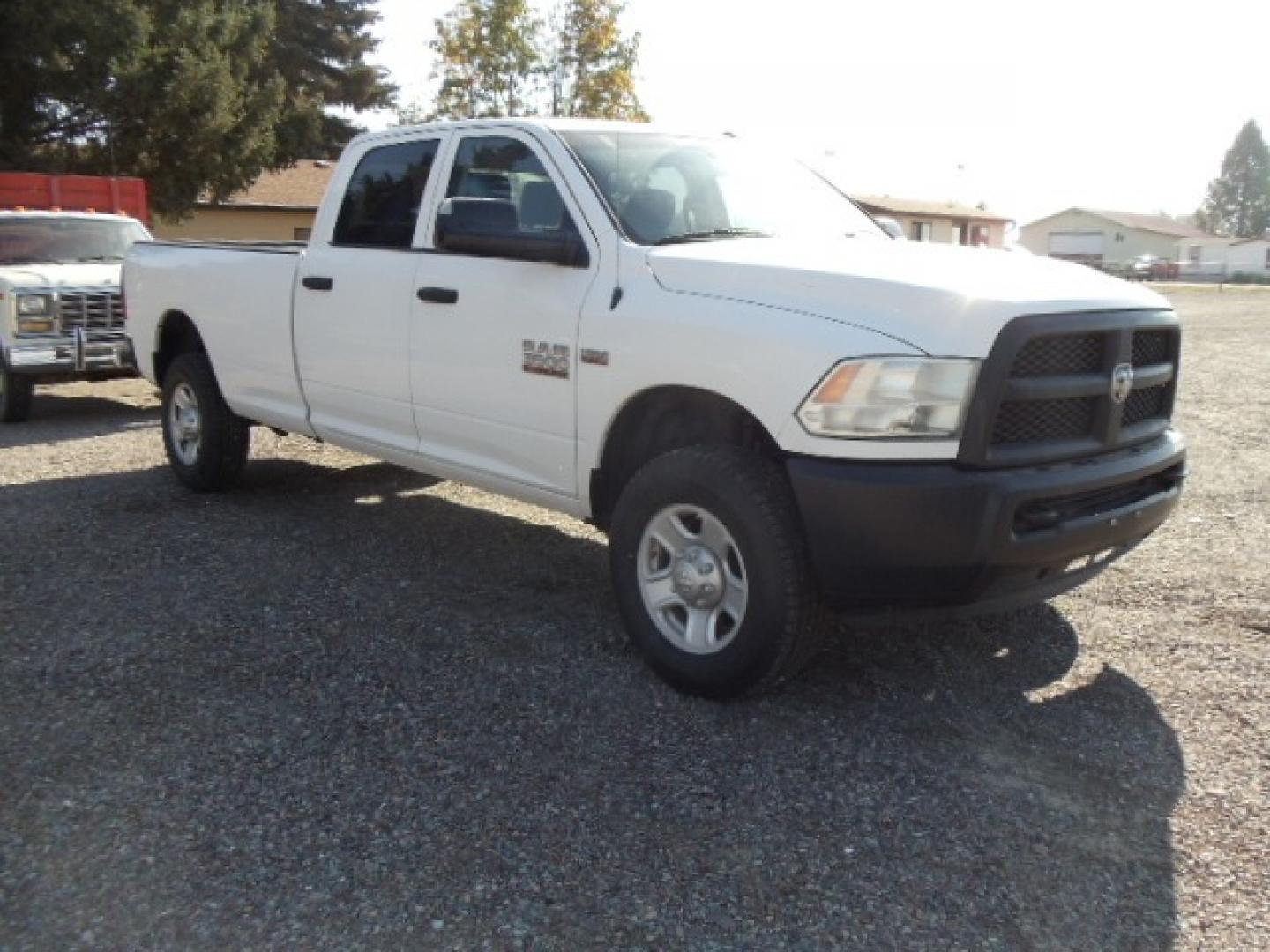 2014 White /Grey RAM 3500 Tradesman (3C63R3GT8EG) with an 5.7L V8 OHV 16V engine, 6-Speed Automatic transmission, located at 5465 Highway 2 W., Columbia Falls, MT, 59912, (406) 892-4407, 48.352188, -114.240929 - Photo#0