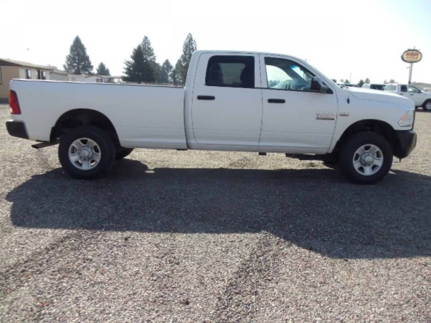 2014 White /Grey RAM 3500 Tradesman (3C63R3GT8EG) with an 5.7L V8 OHV 16V engine, 6-Speed Automatic transmission, located at 5465 Highway 2 W., Columbia Falls, MT, 59912, (406) 892-4407, 48.352188, -114.240929 - Photo#9